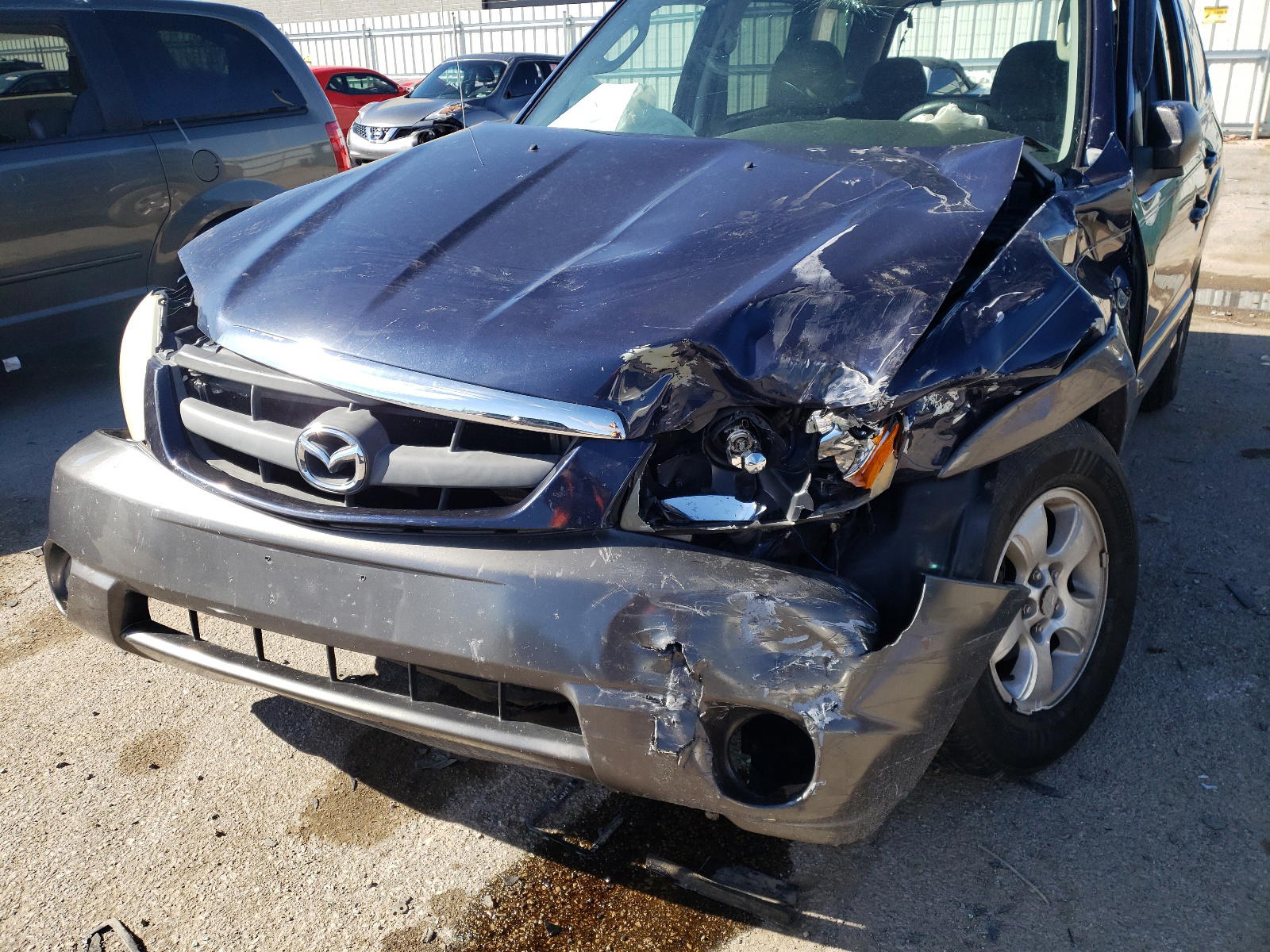 Photo 9 from auction – 2004 MAZDA TRIBUTE LX with VIN 4F2YZ94174KM13477