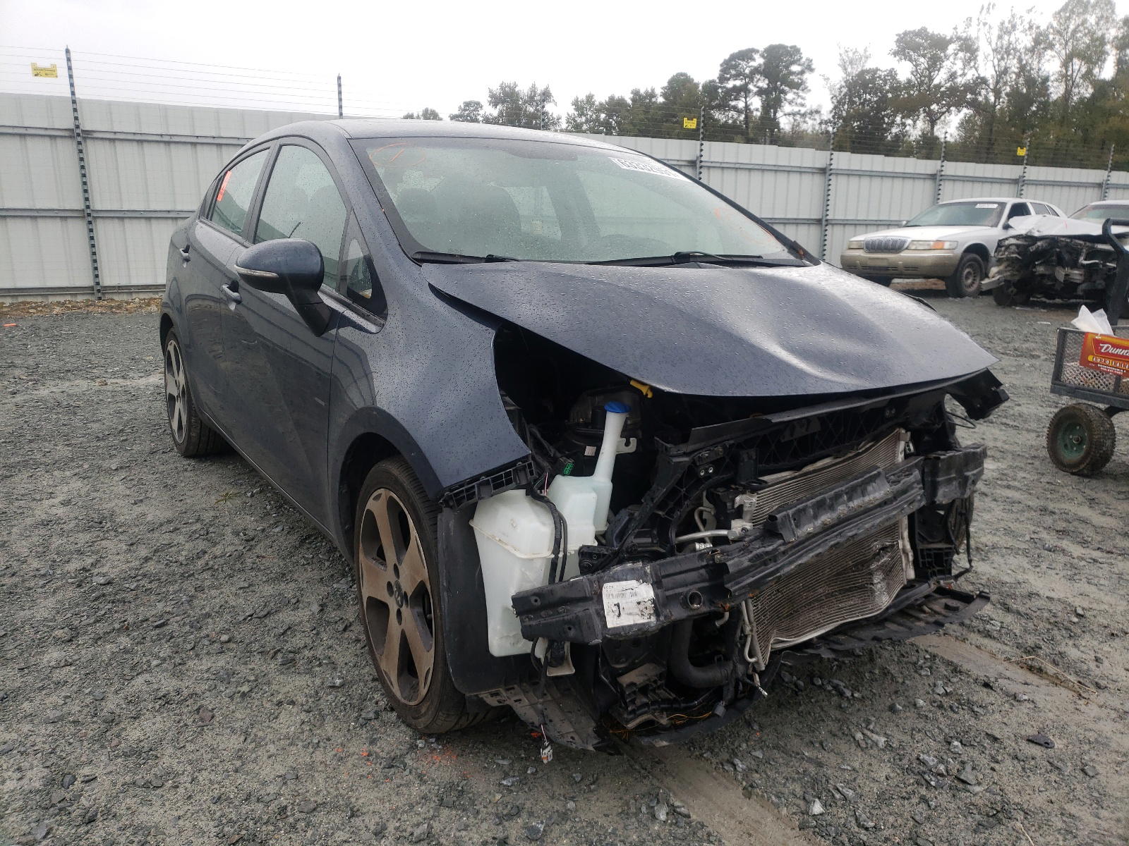KIA RIO EX 2012 with VIN KNADN4A3XC6047327 - Photo from auction