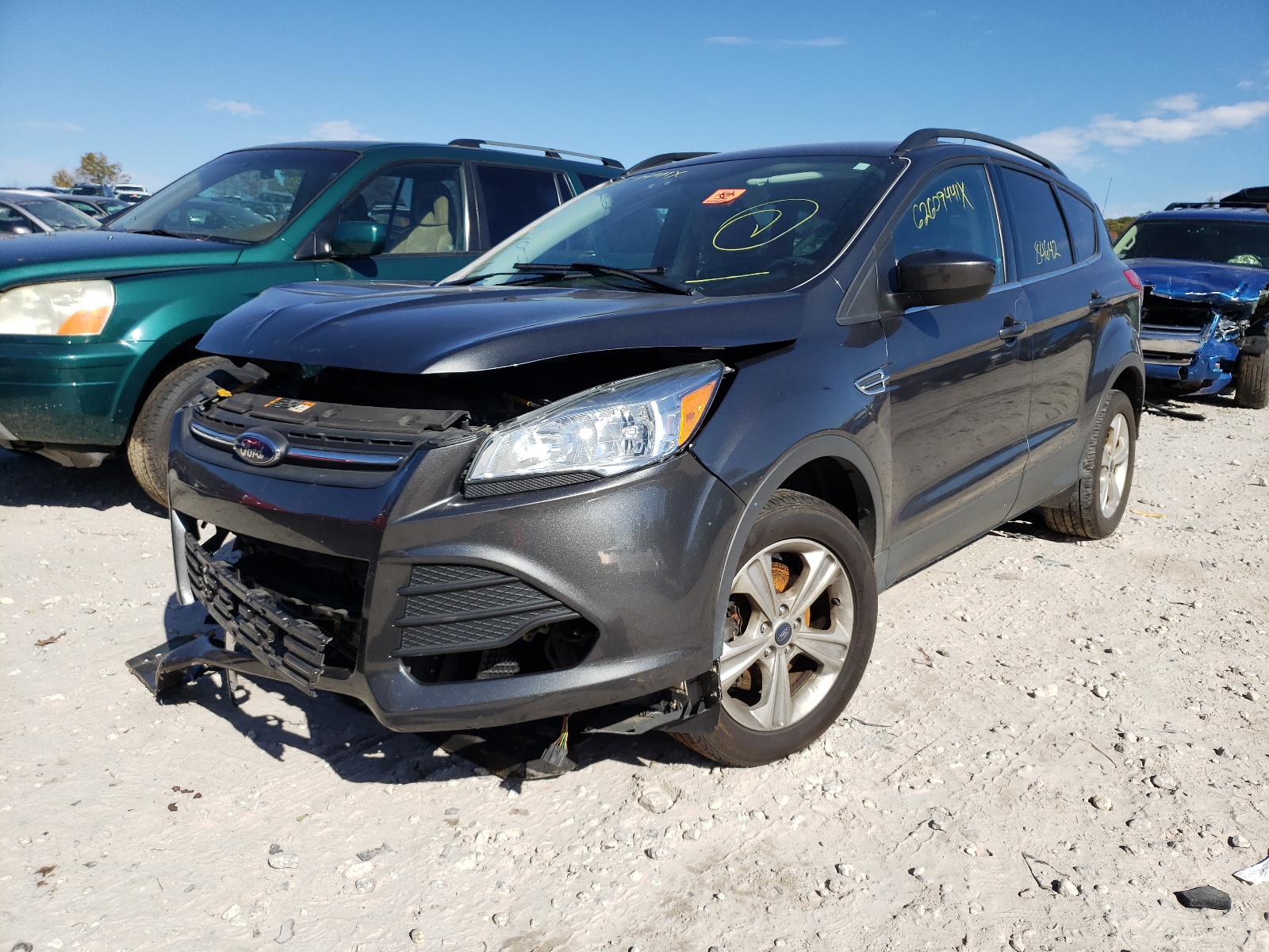 Photo 2 from auction – 2016 FORD ESCAPE SE with VIN 1FMCU9GX0GUC16583