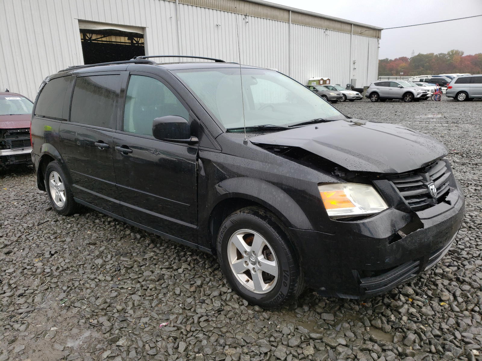 DODGE GRAND CARA 2010 with VIN 2D4RN3D11AR335730 - Photo from auction