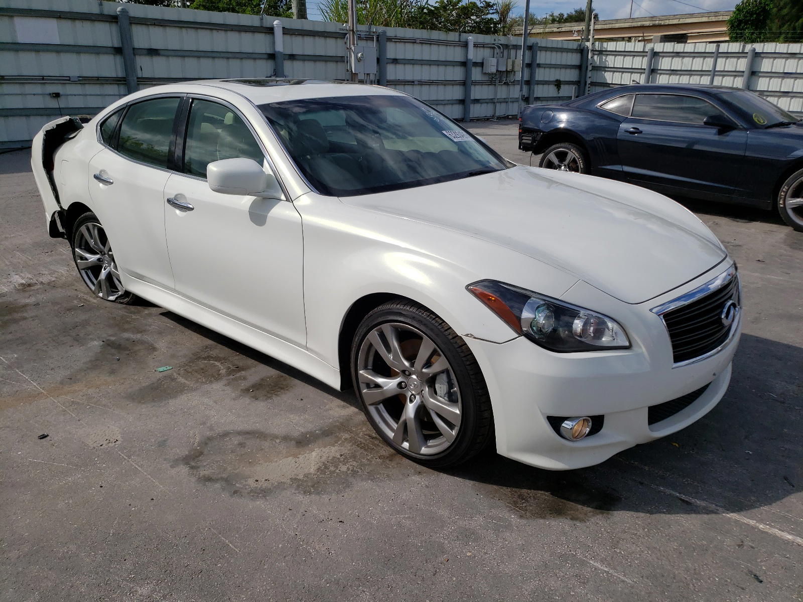 INFINITI M56 2011 with VIN JN1AY1AP4BM520439 - Photo from auction