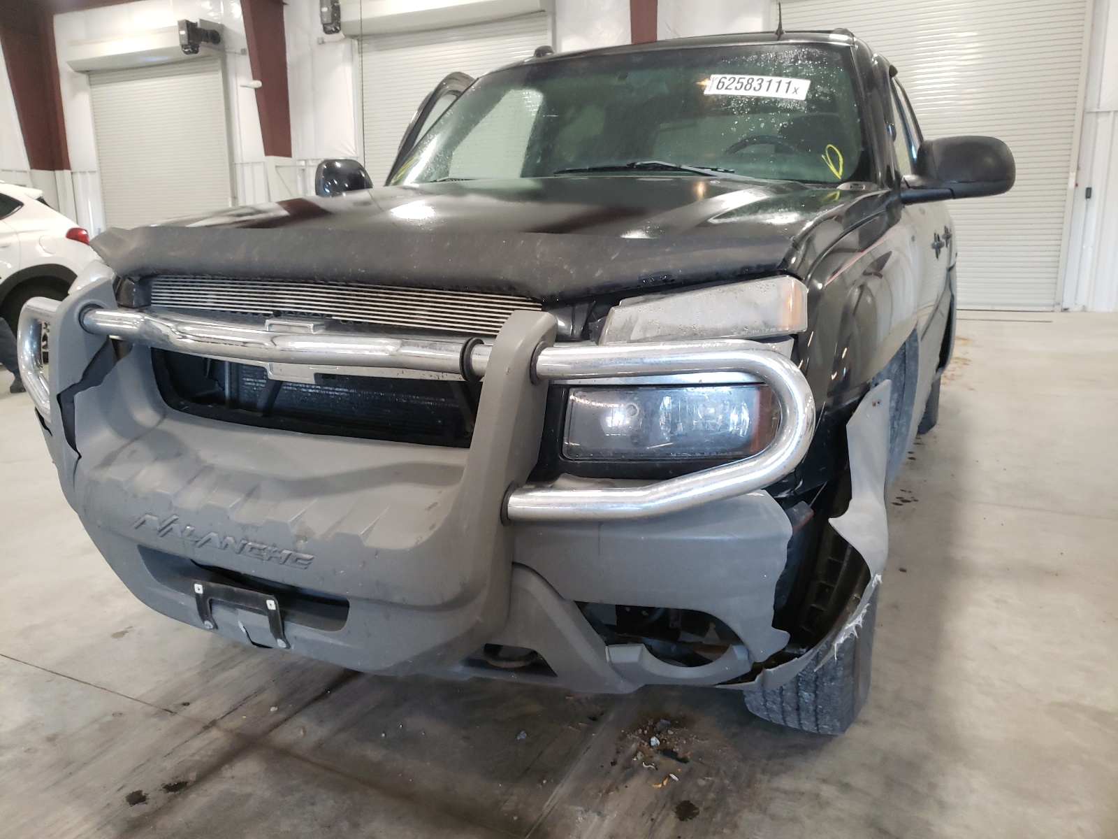 Photo 9 from auction – 2002 CHEVROLET AVALANCHE with VIN 3GNEK13T62G236444