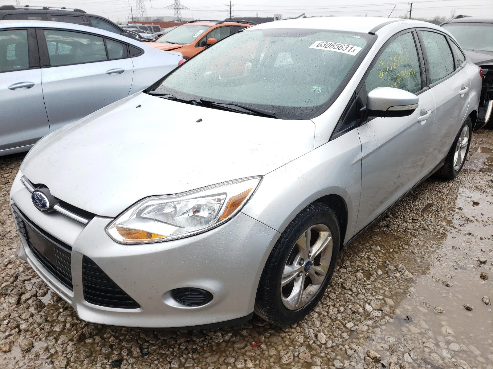 Photo 2 from auction – 2014 FORD FOCUS SE with VIN 1FADP3F22EL285934
