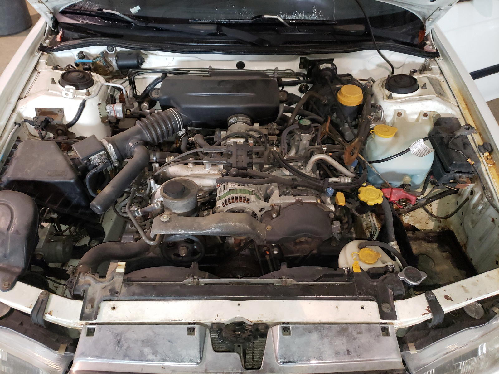 Photo 7 from auction – 1997 SUBARU LEGACY L with VIN 4S3BK4358V7322790