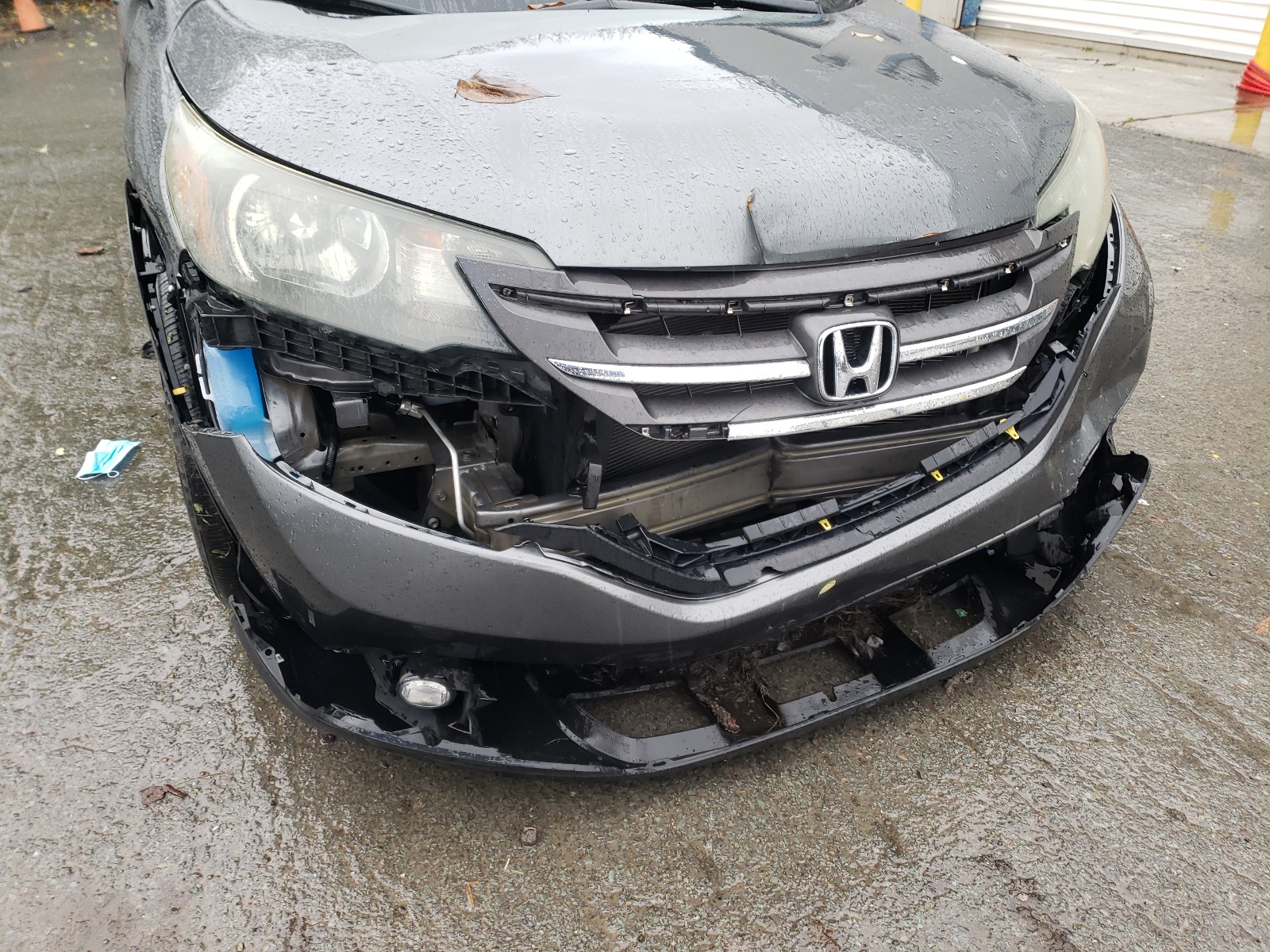Photo 9 from auction – 2014 HONDA CR-V EXL with VIN 5J6RM3H70EL024491