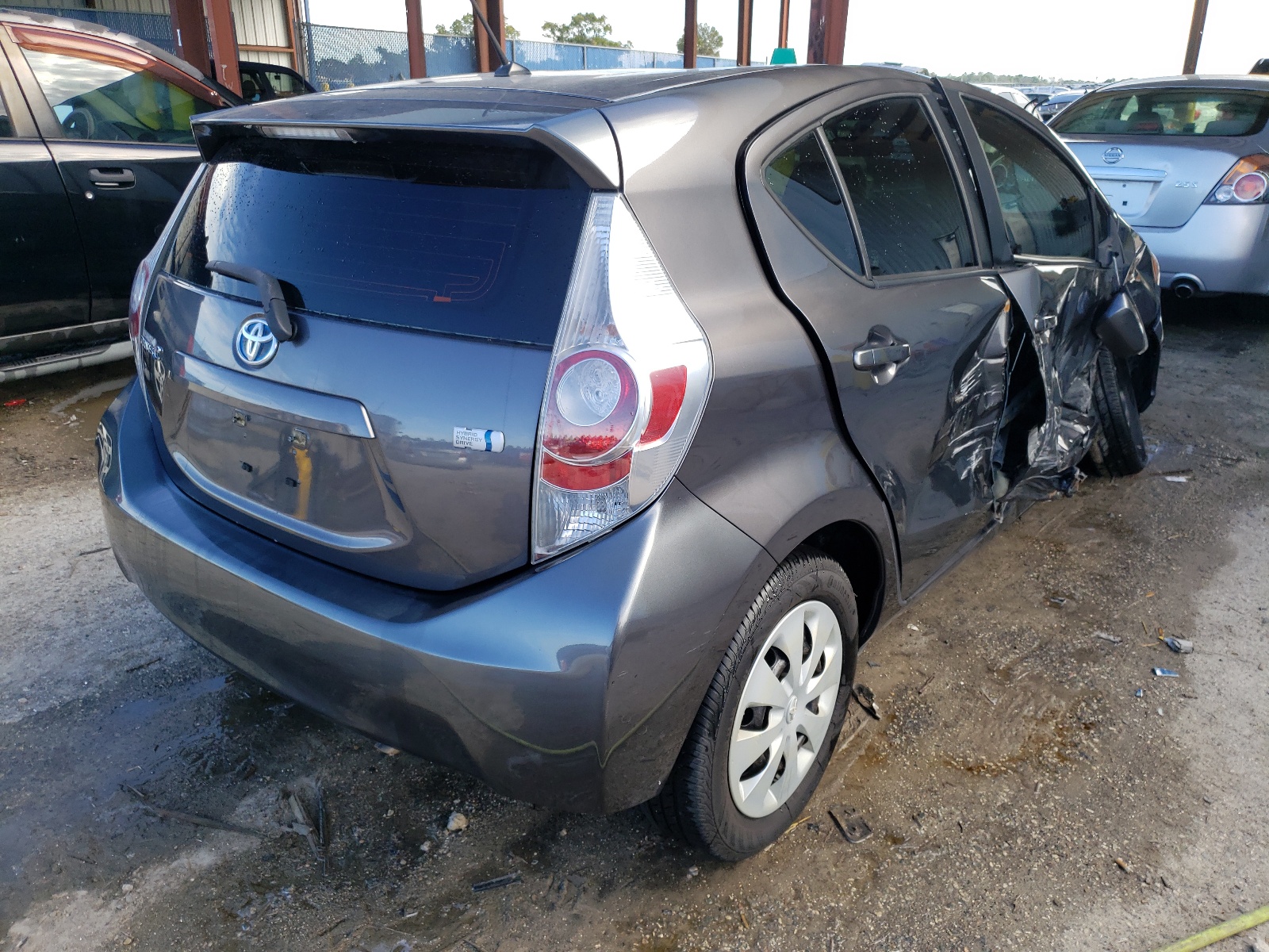 Photo 4 from auction – 2014 TOYOTA PRIUS C with VIN JTDKDTB31E1062322