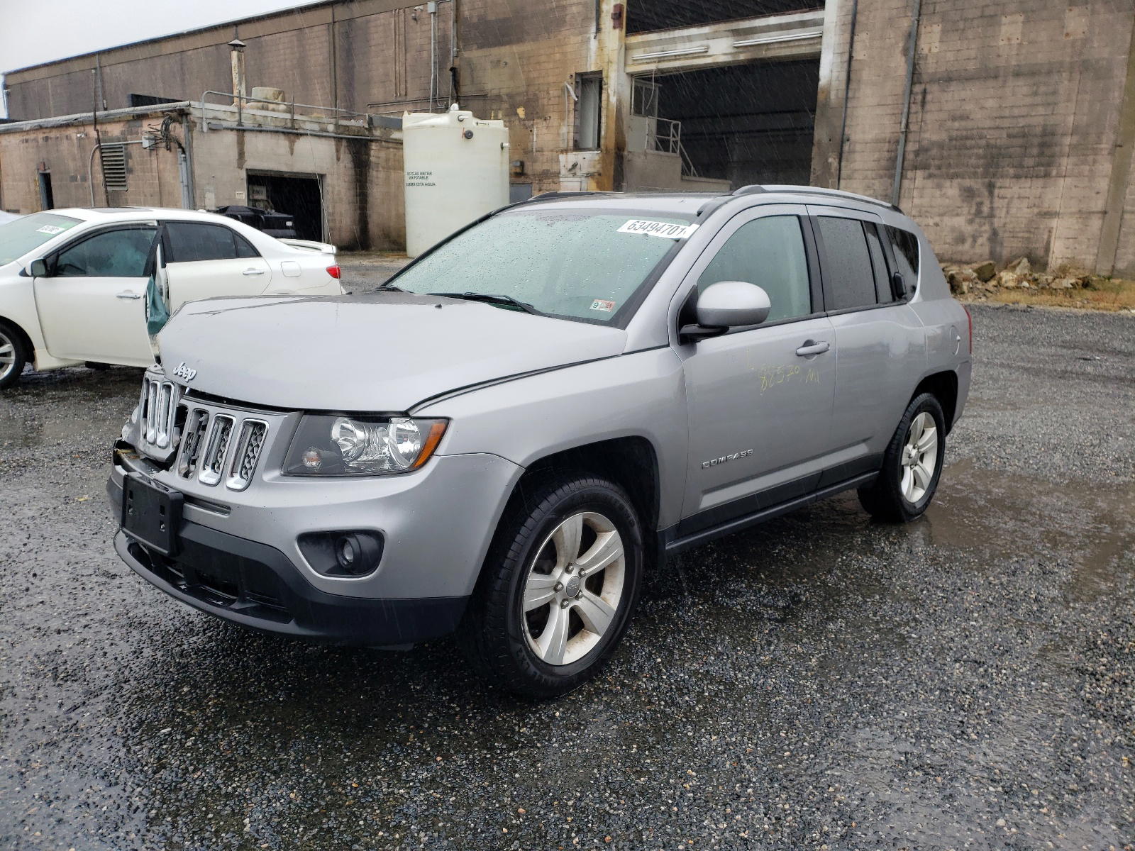 Photo 2 from auction – 2015 JEEP COMPASS LA with VIN 1C4NJDEB4FD259564
