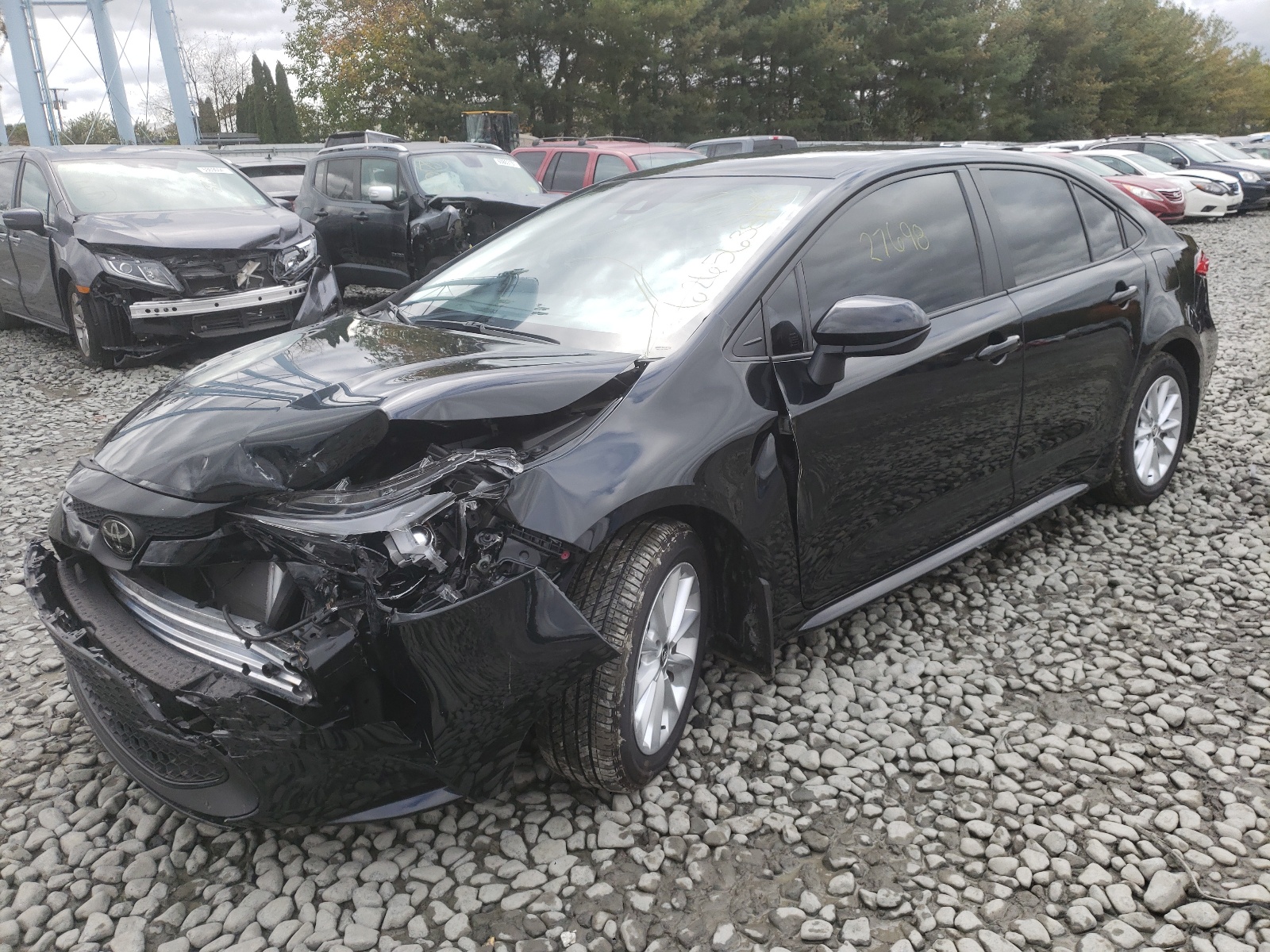 Photo 2 from auction – 2021 TOYOTA COROLLA LE with VIN JTDVPMAE7MJ119604