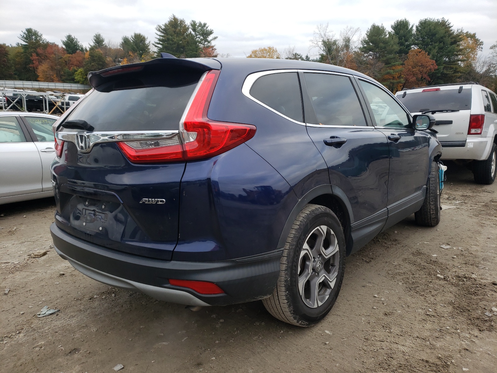 Photo 4 from auction – 2017 HONDA CR-V EX with VIN 5J6RW2H51HL045034