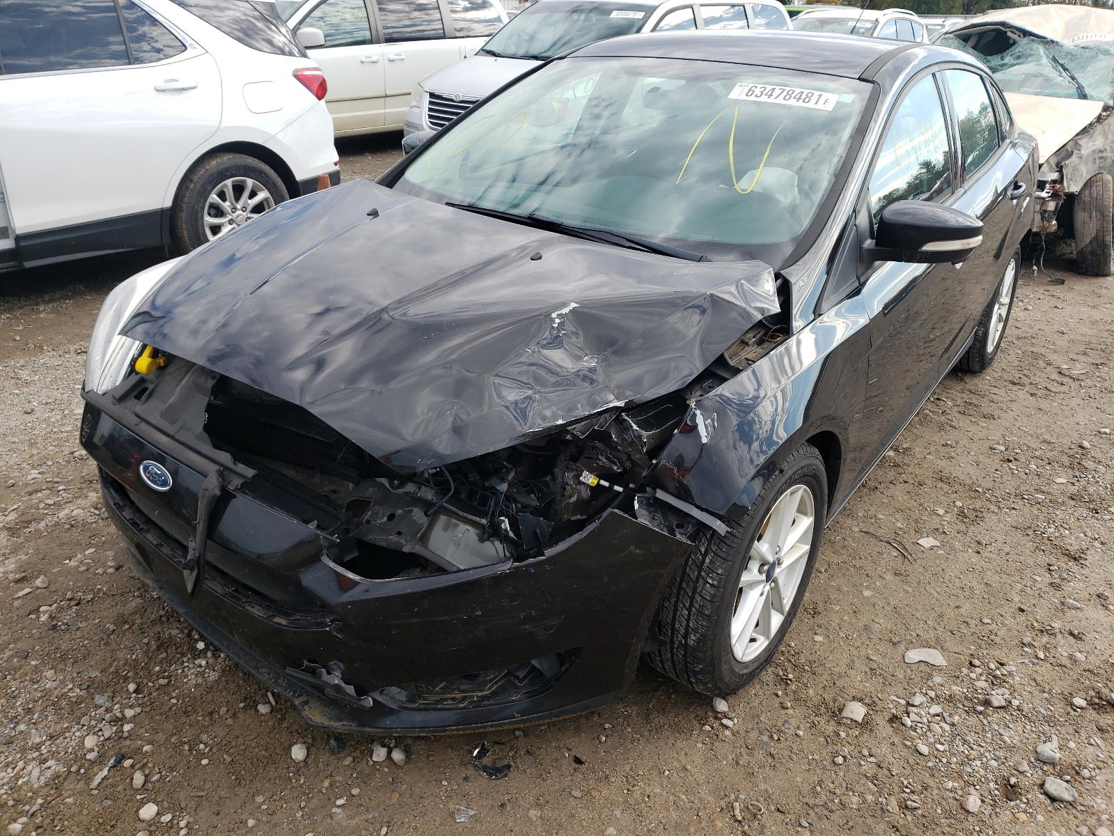 Photo 2 from auction – 2015 FORD FOCUS SE with VIN 1FADP3F23FL293297