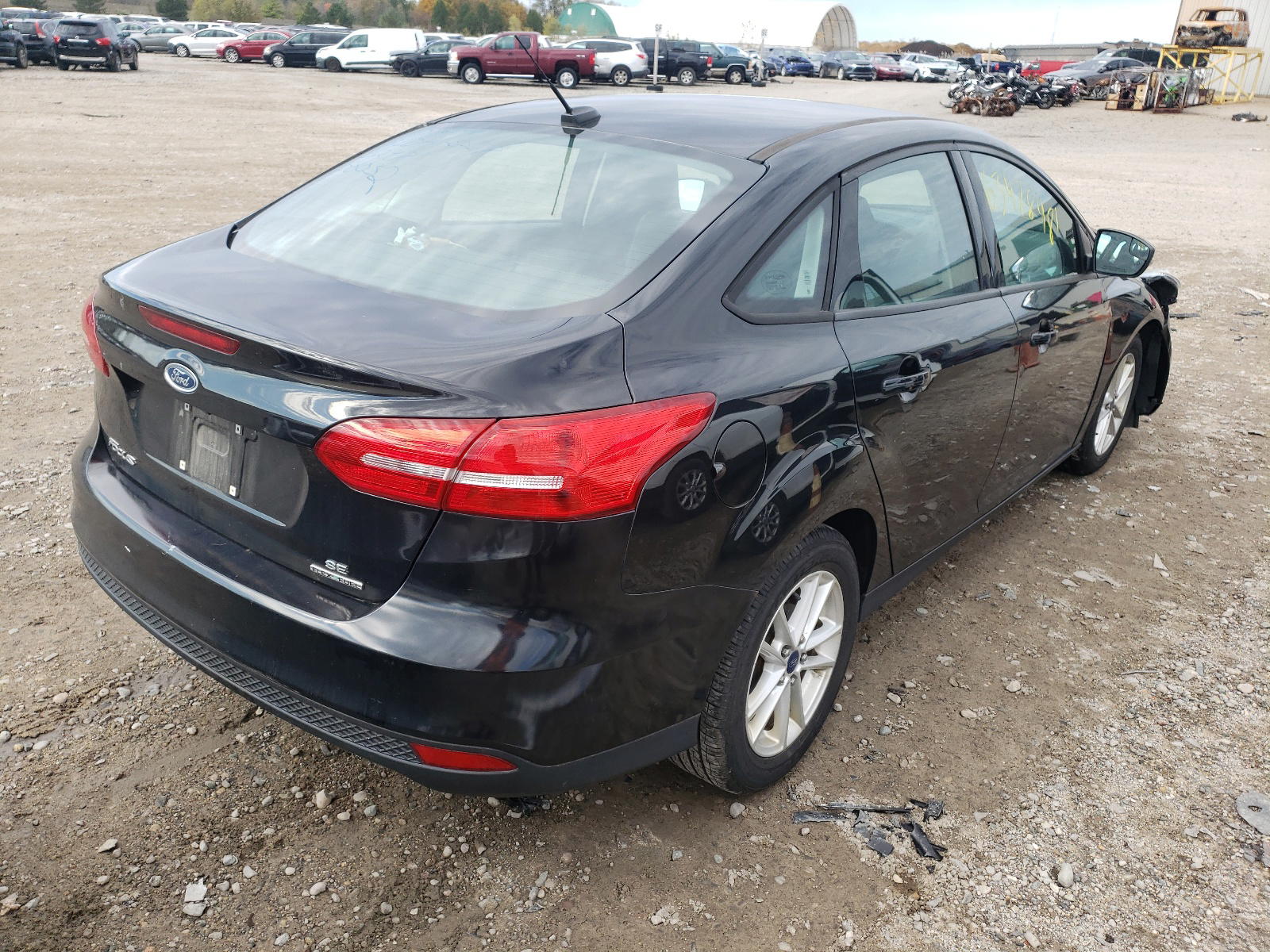 Photo 4 from auction – 2015 FORD FOCUS SE with VIN 1FADP3F23FL293297