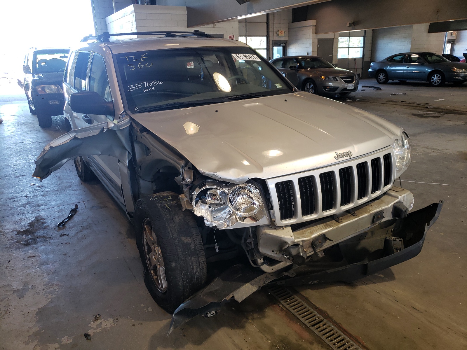 JEEP GRAND CHER 2005 with VIN 1J8HS48N25C557866 - Photo from auction