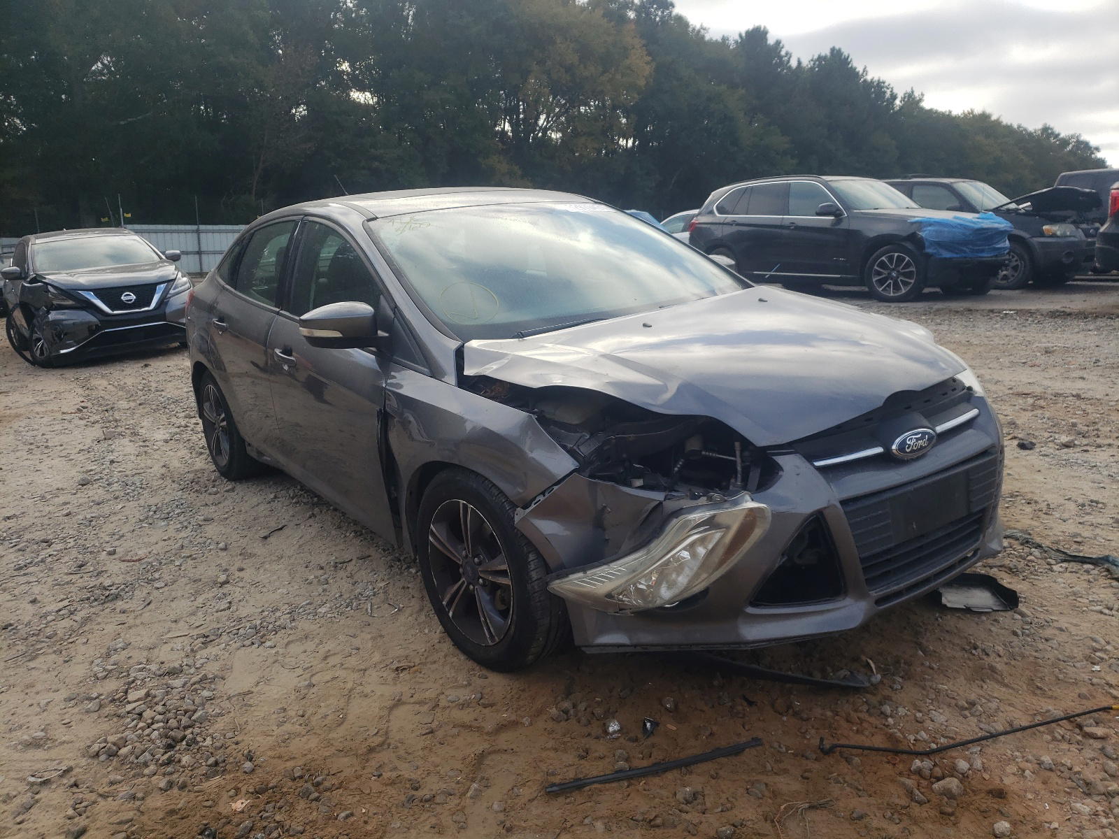 FORD FOCUS SE 2014 with VIN 1FADP3F22EL105657 - Photo from auction
