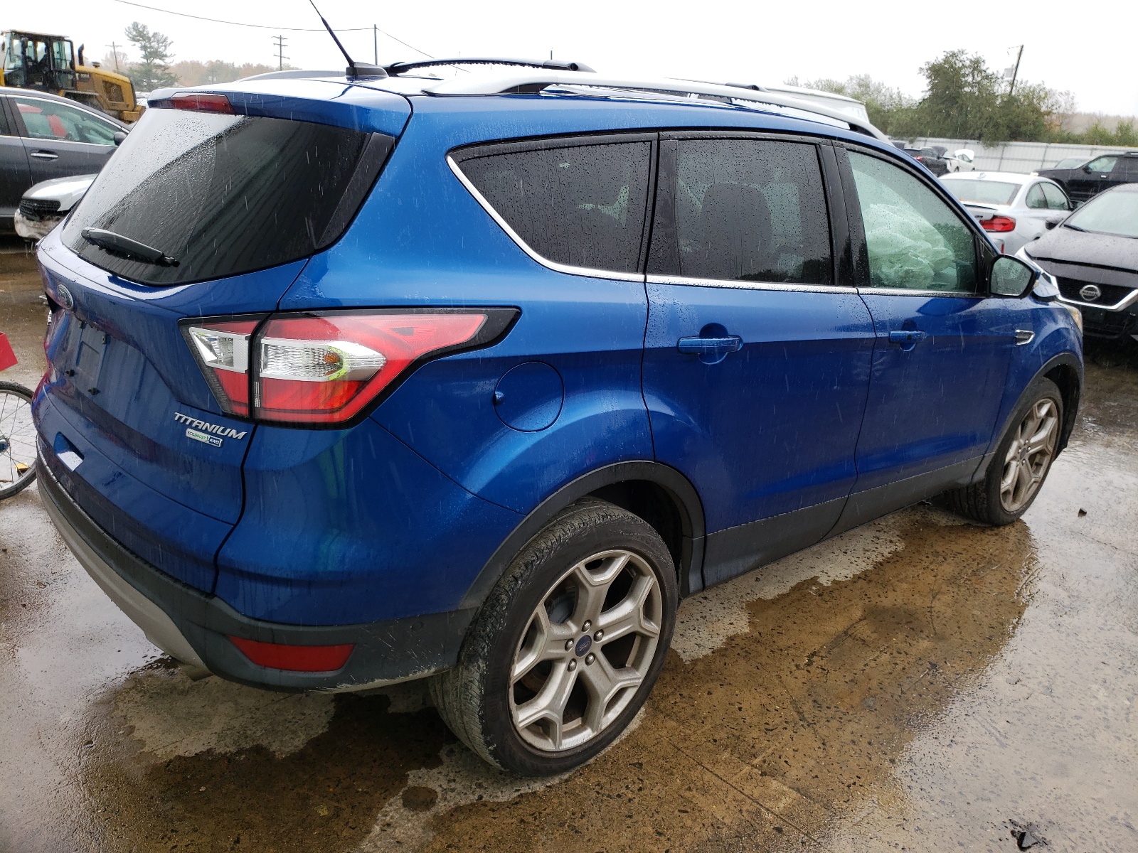 Photo 4 from auction – 2017 FORD ESCAPE TIT with VIN 1FMCU9J91HUD02917
