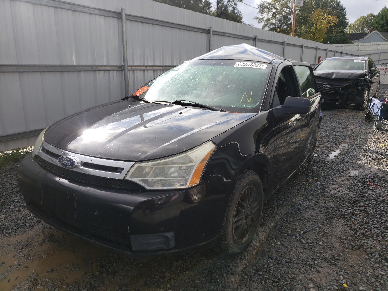 Photo 2 from auction – 2011 FORD FOCUS SE with VIN 1FAHP3FN7BW180330