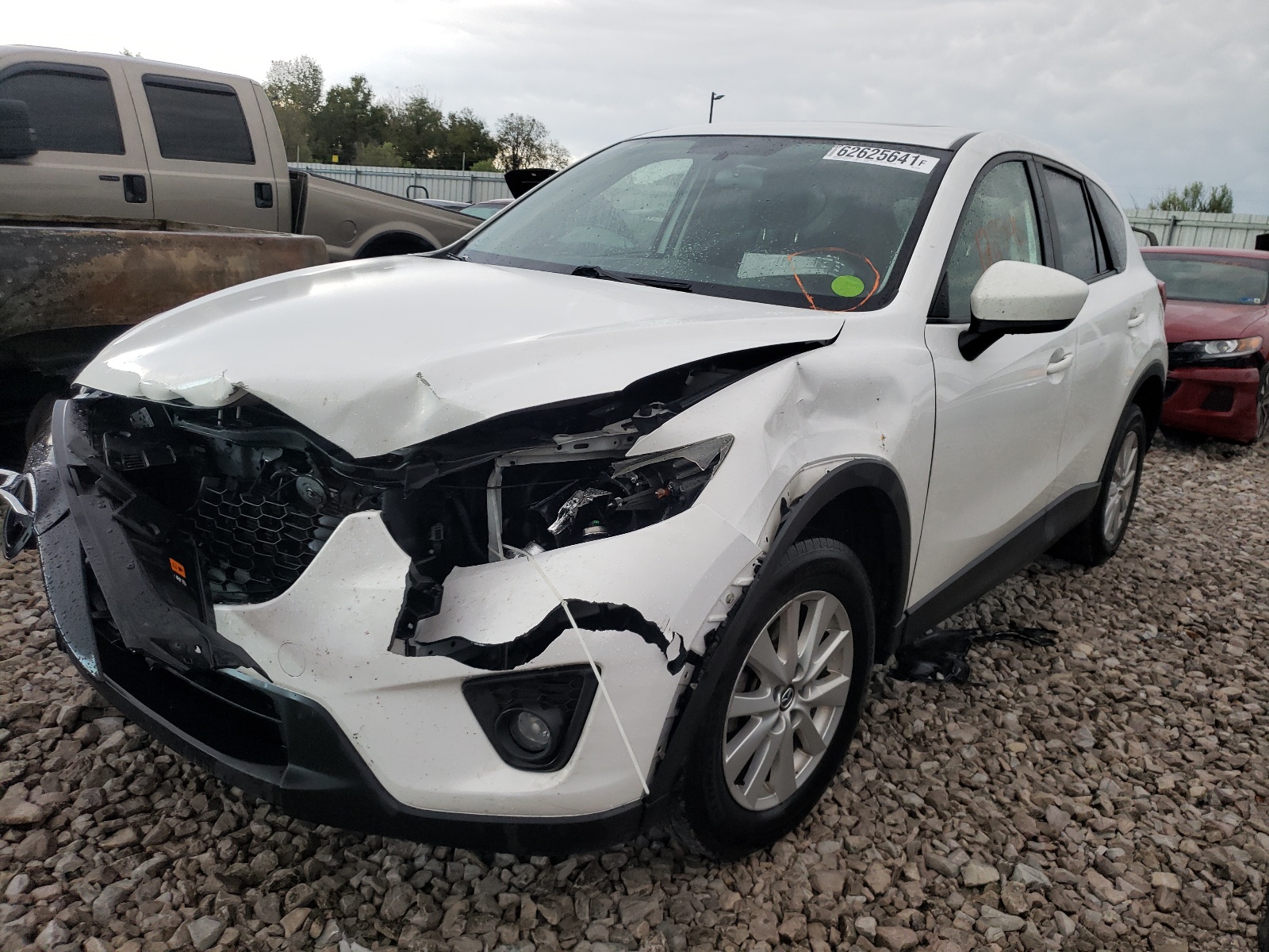 Photo 2 from auction – 2014 MAZDA CX-5 TOURI with VIN JM3KE4CY9E0387794