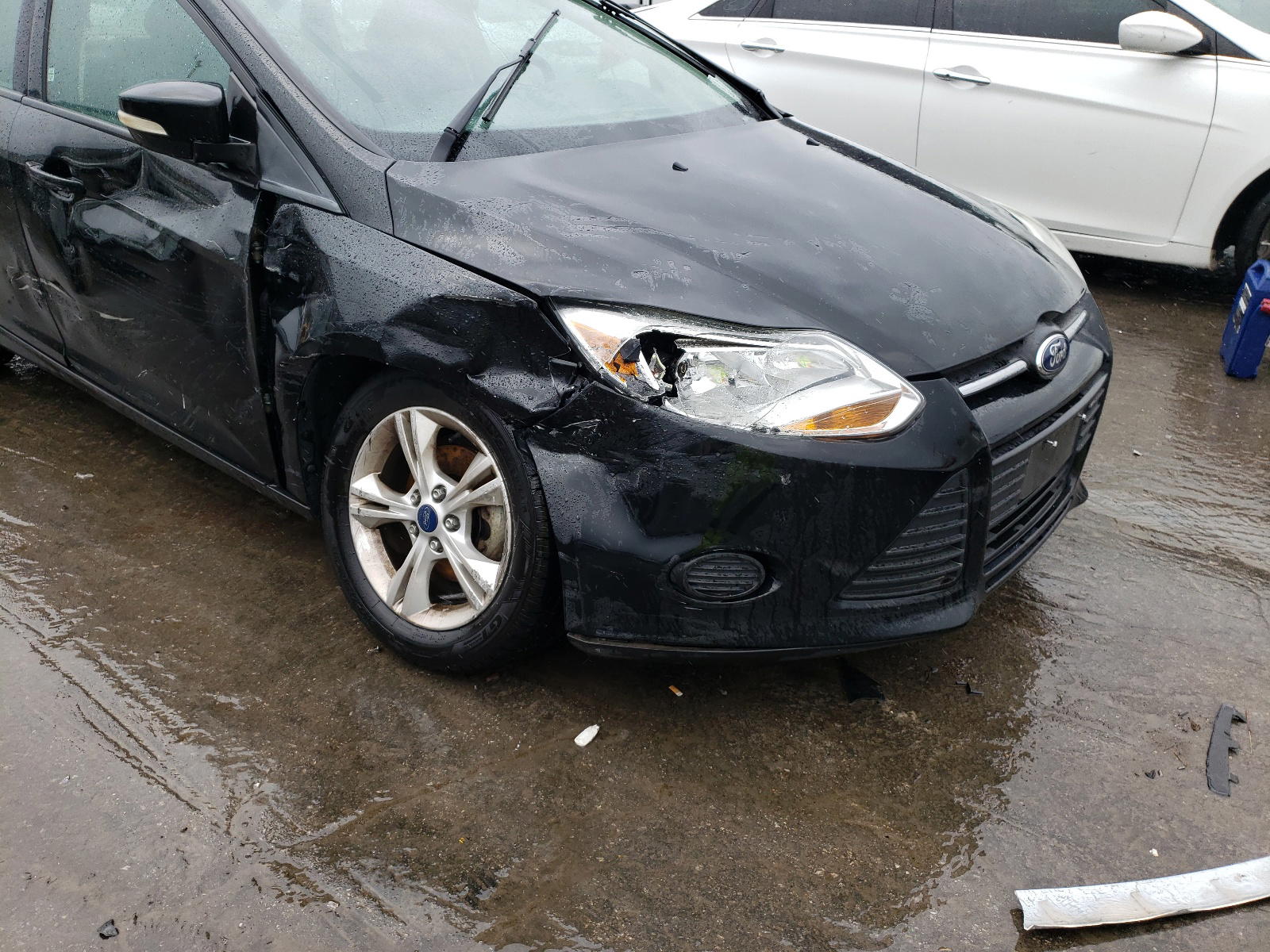 Photo 9 from auction – 2013 FORD FOCUS SE with VIN 1FADP3F22DL210018