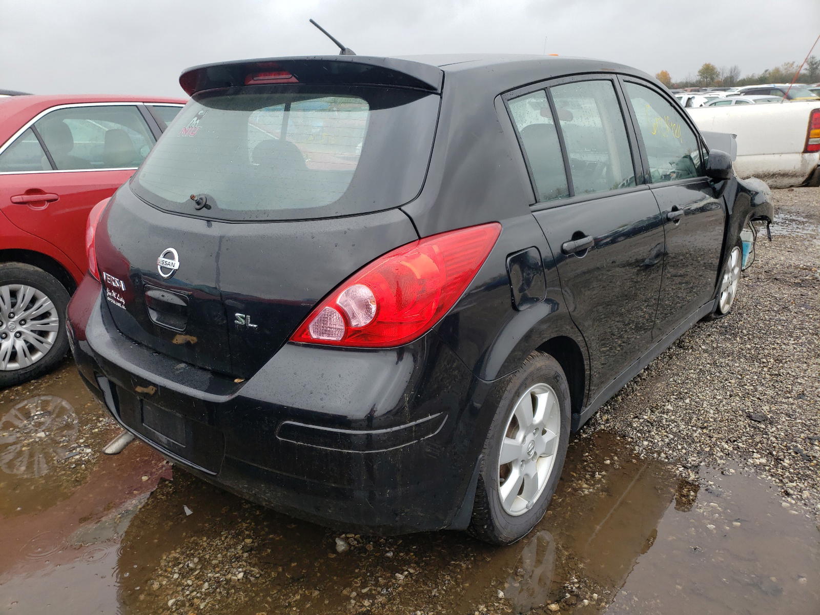 Photo 4 from auction – 2009 NISSAN VERSA with VIN 3N1BC13E79L383712