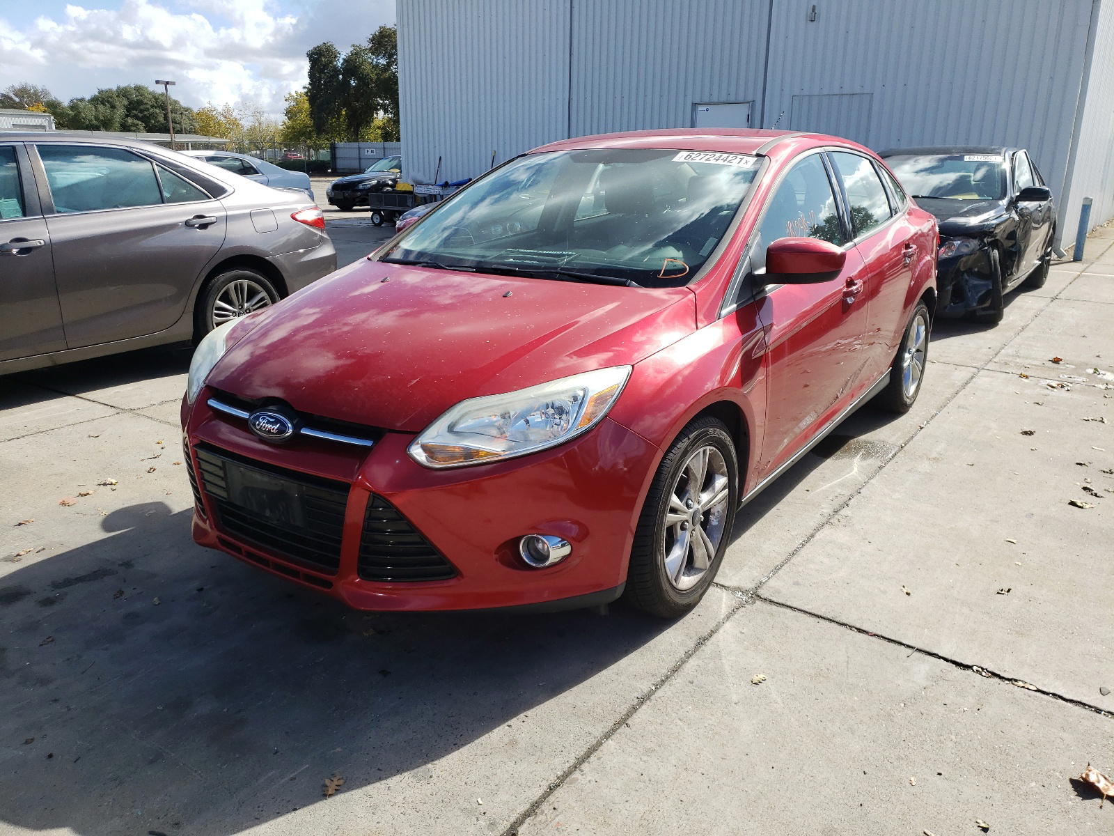 Photo 2 from auction – 2012 FORD FOCUS SE with VIN 1FAHP3F2XCL400780