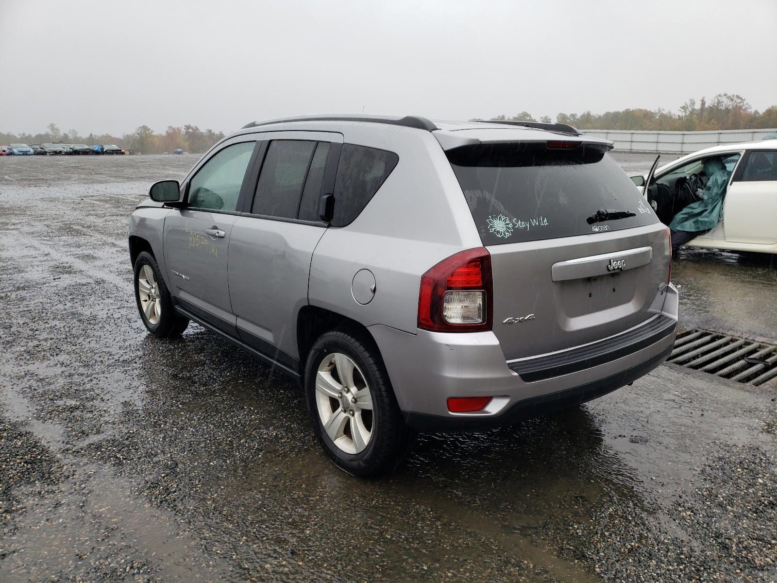Photo 3 from auction – 2015 JEEP COMPASS LA with VIN 1C4NJDEB4FD259564