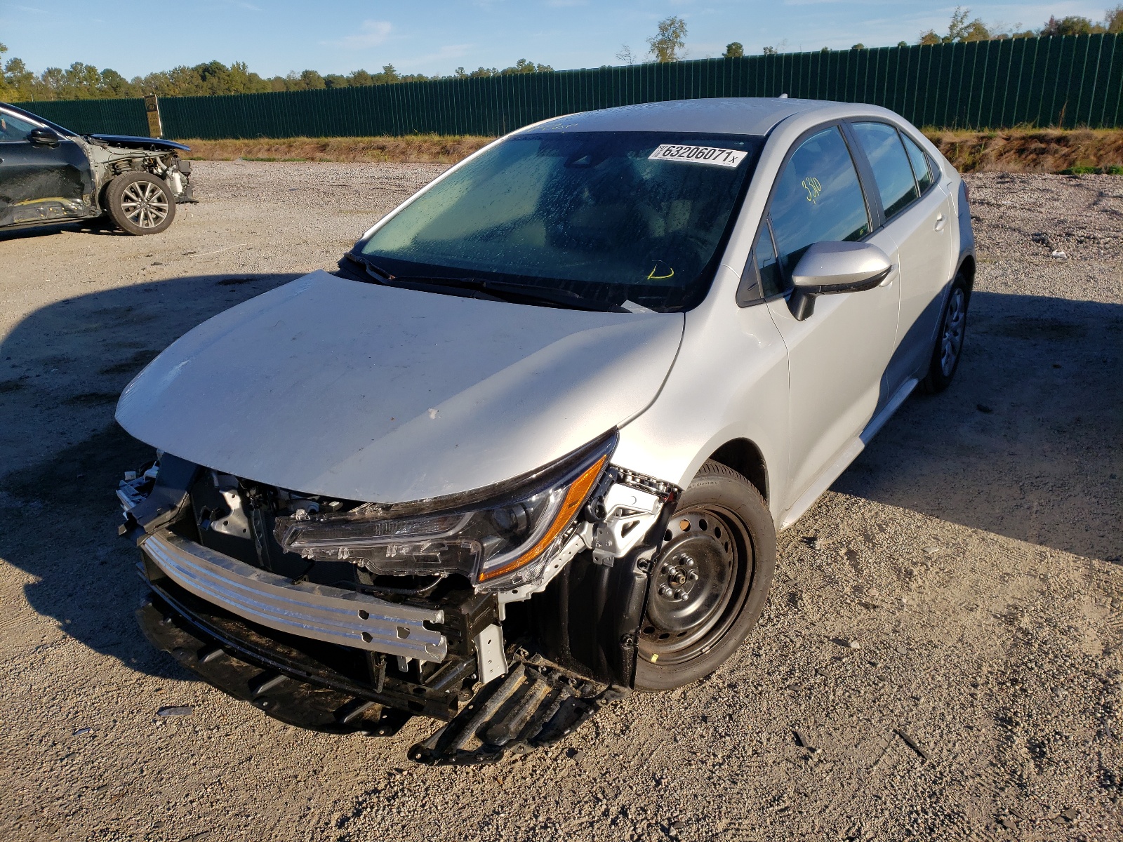 Photo 2 from auction – 2022 TOYOTA COROLLA LE with VIN 5YFEPMAE6NP277378