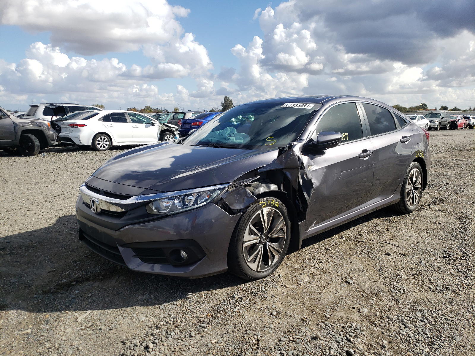 Photo 2 from auction – 2016 HONDA CIVIC EX with VIN 19XFC1F31GE222329