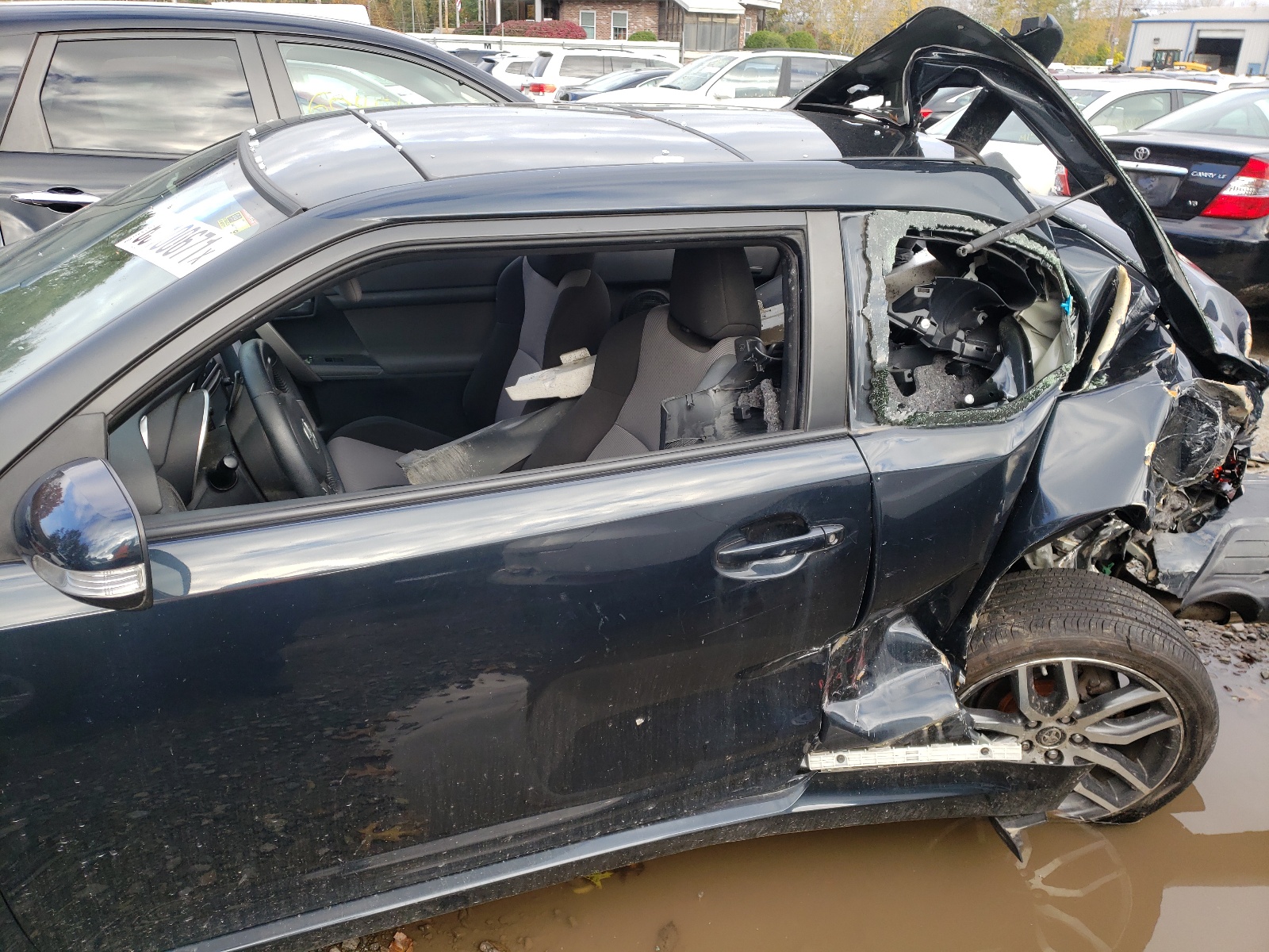 Photo 10 from auction – 2015 TOYOTA SCION TC with VIN JTKJF5C75FJ013282