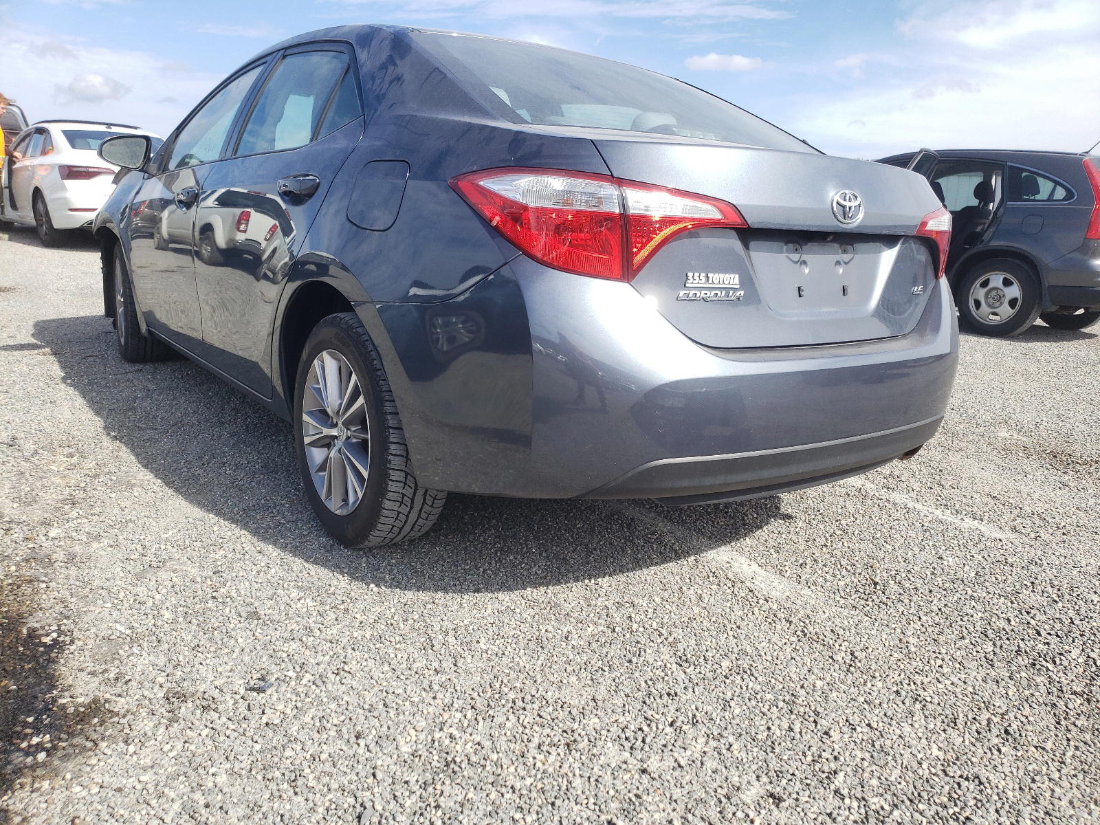 Photo 3 from auction – 2014 TOYOTA COROLLA L with VIN 2T1BURHE6EC099759