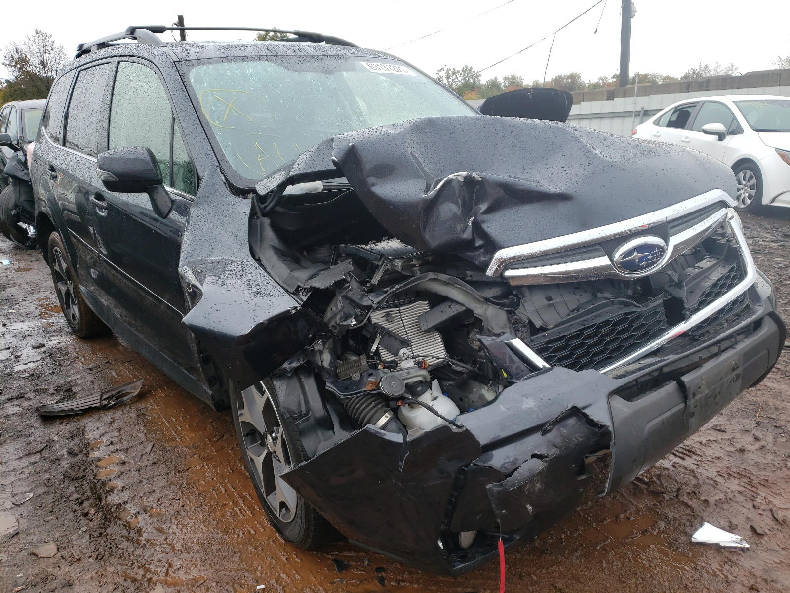 SUBARU FORESTER 2 2014 with VIN JF2SJGMC1EH443822 - Photo from auction