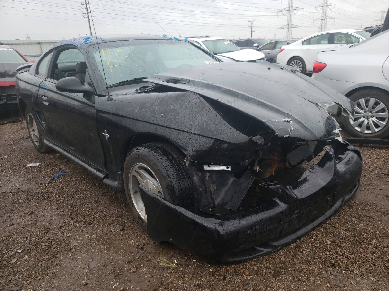 FORD MUSTANG 1998 with VIN 1FAFP4048WF167041 - Photo from auction