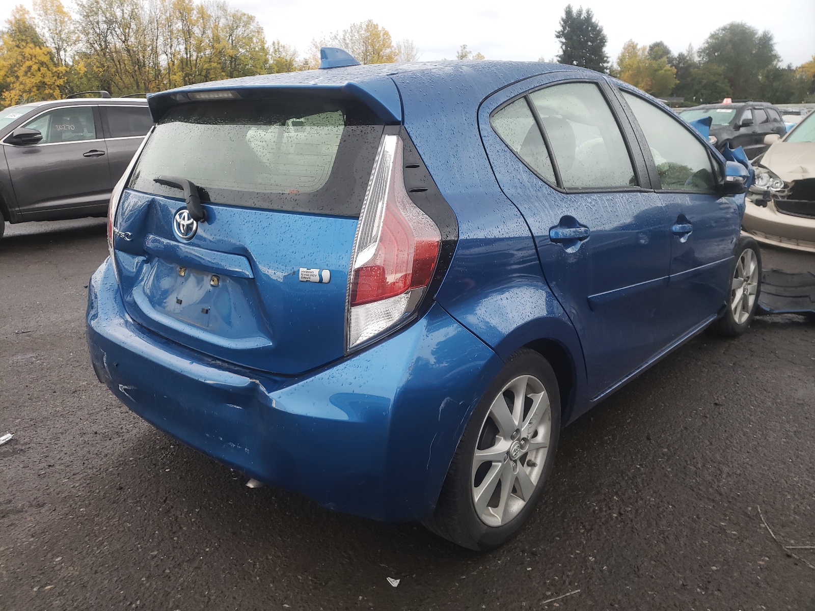 Photo 4 from auction – 2015 TOYOTA PRIUS C with VIN JTDKDTB38F1091768
