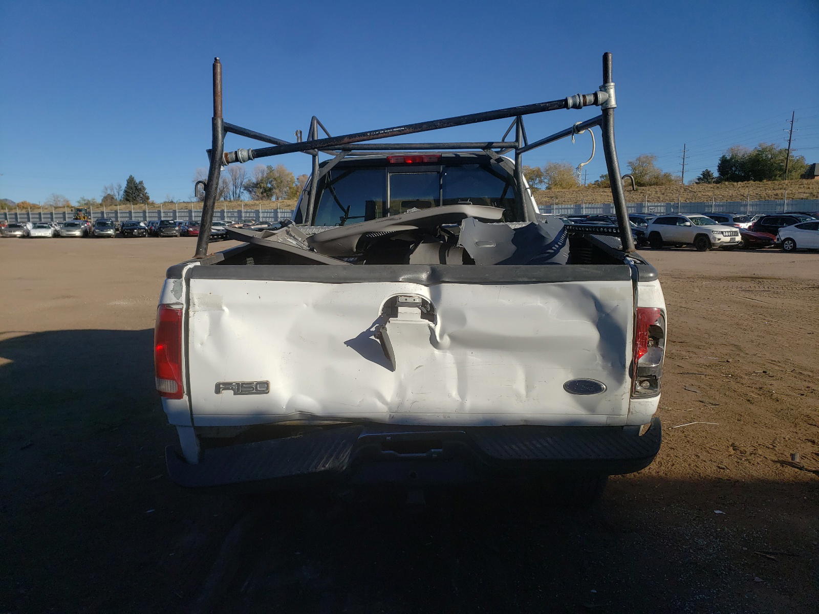 Photo 9 from auction – 2002 FORD F150 with VIN 1FTRX18LX2NA91730