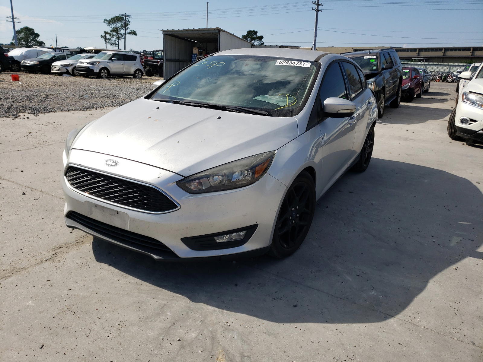 Photo 2 from auction – 2016 FORD FOCUS SE with VIN 1FADP3K29GL239350