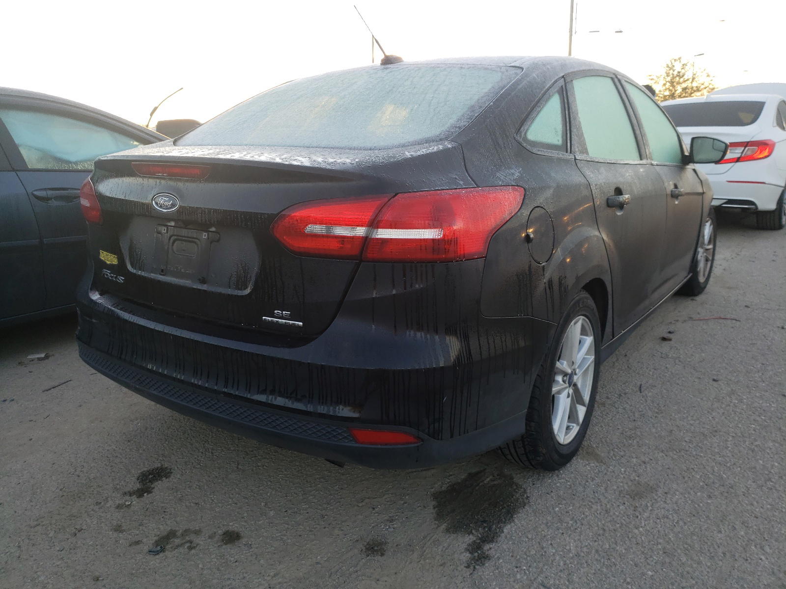 Photo 4 from auction – 2016 FORD FOCUS SE with VIN 1FADP3F24GL403615