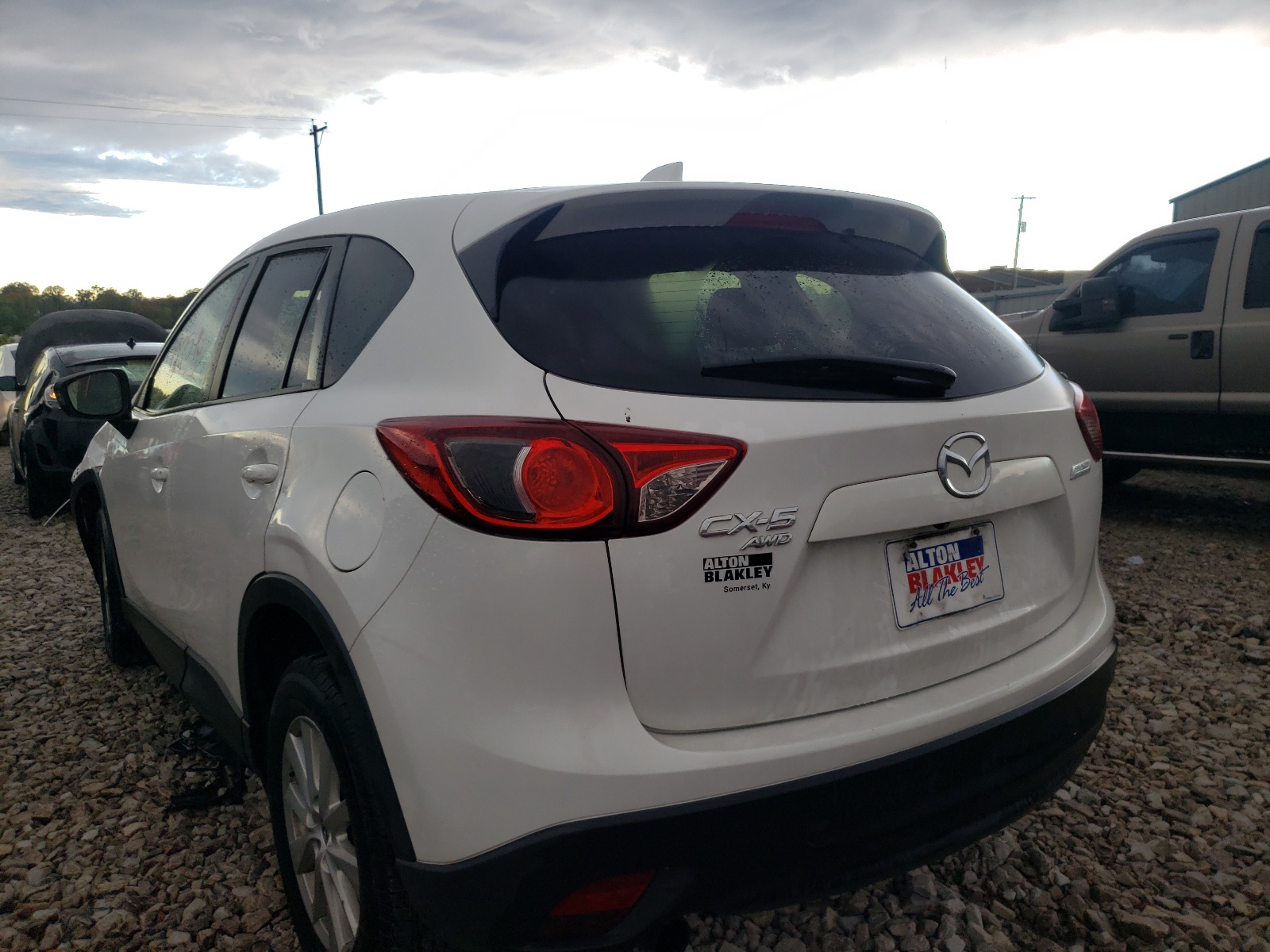 Photo 3 from auction – 2014 MAZDA CX-5 TOURI with VIN JM3KE4CY9E0387794