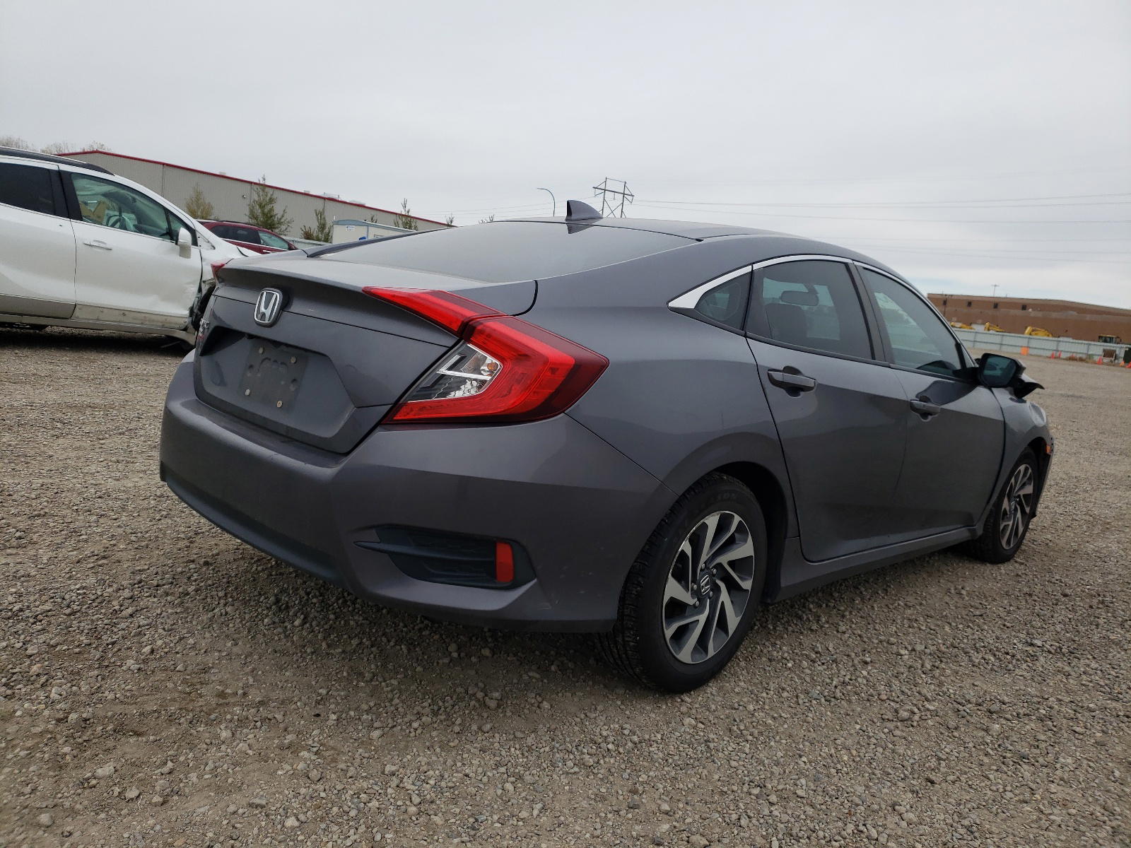 Photo 4 from auction – 2017 HONDA CIVIC EX with VIN 2HGFC2F71HH566405