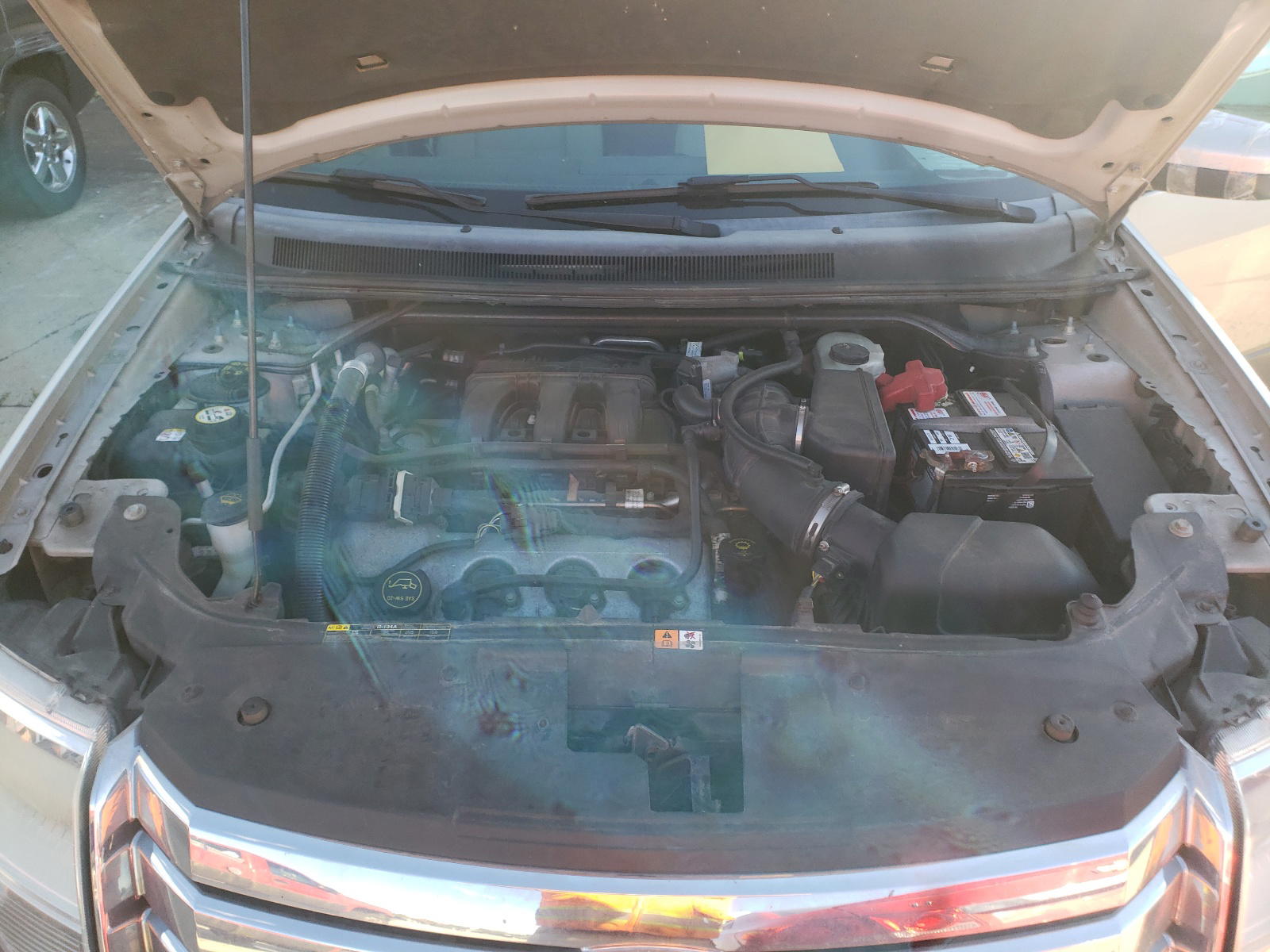 Photo 7 from auction – 2008 FORD TAURUS X S with VIN 1FMDK02W68GA13282