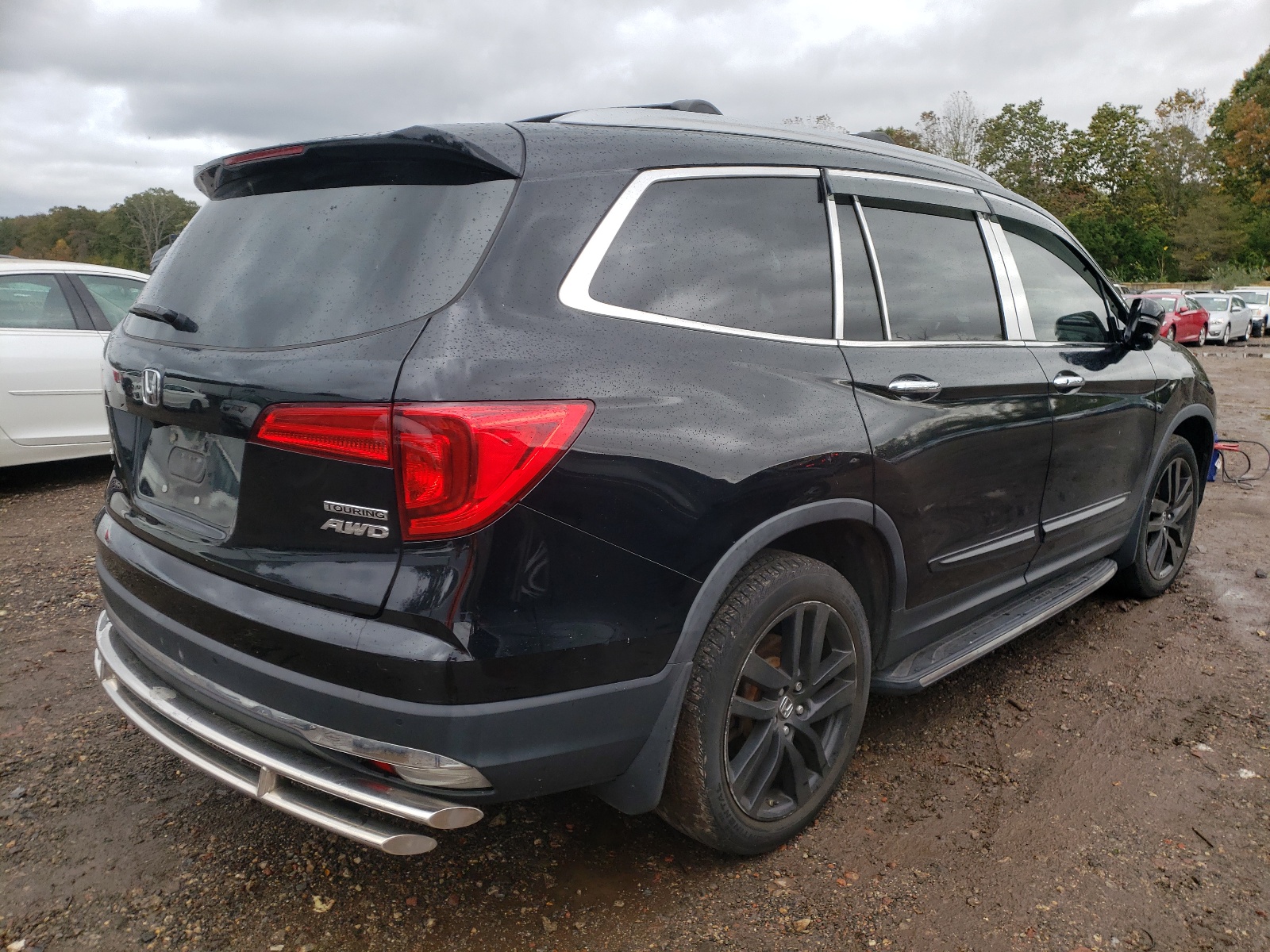 Photo 4 from auction – 2017 HONDA PILOT TOUR with VIN 5FNYF6H97HB040628