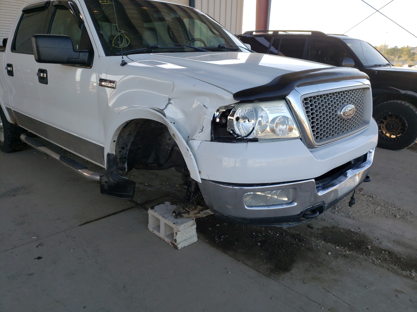 Photo 9 from auction – 2004 FORD F150 SUPER with VIN 1FTPW14564KC20519