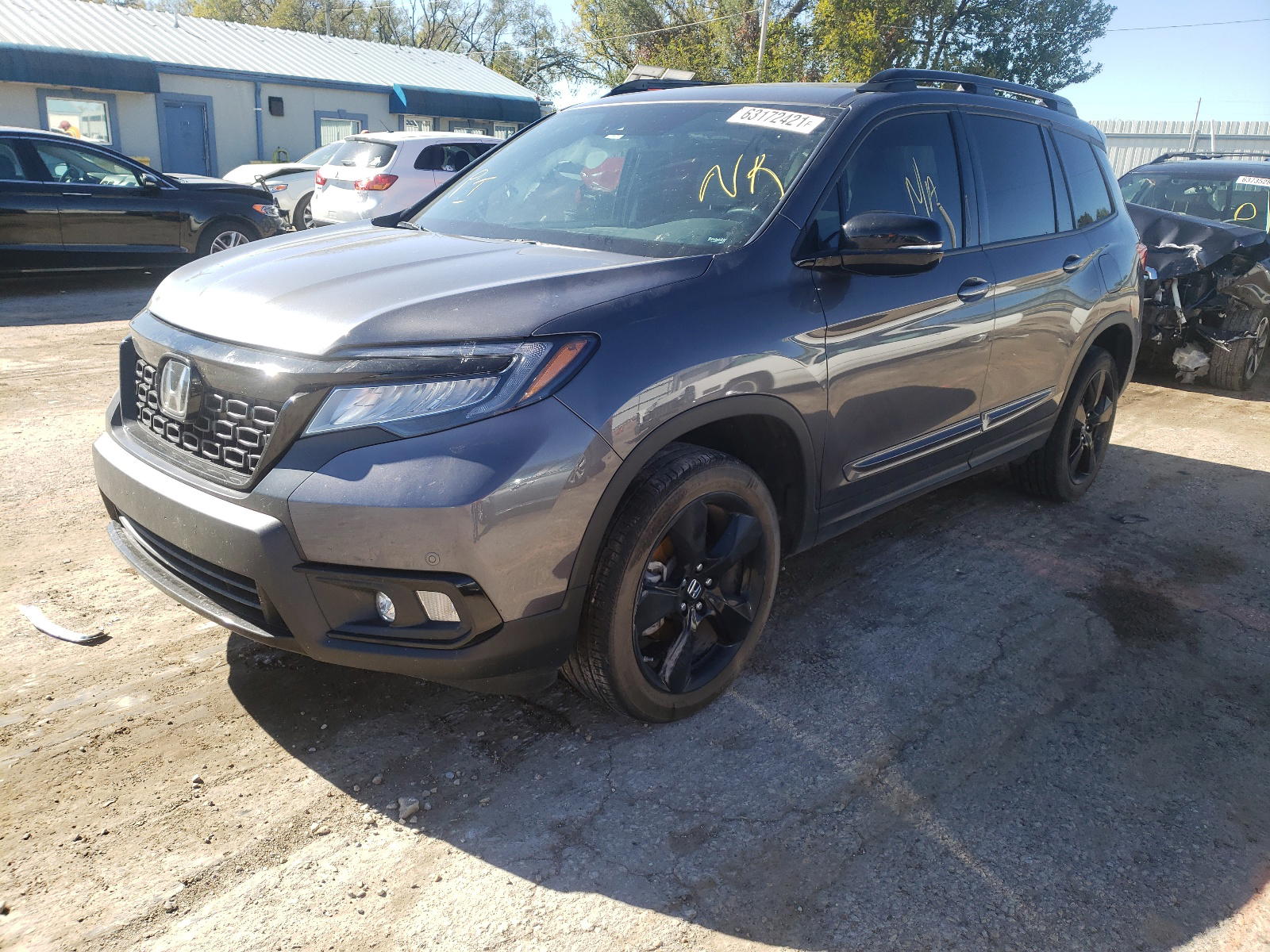 Photo 2 from auction – 2019 HONDA PASSPORT E with VIN 5FNYF8H02KB027192