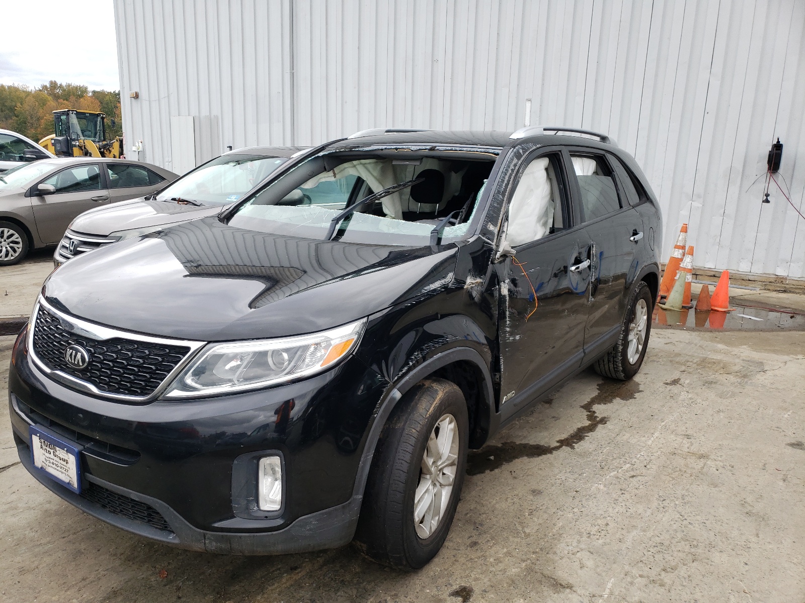 Photo 9 from auction – 2015 KIA SORENTO LX with VIN 5XYKTCA63FG562420