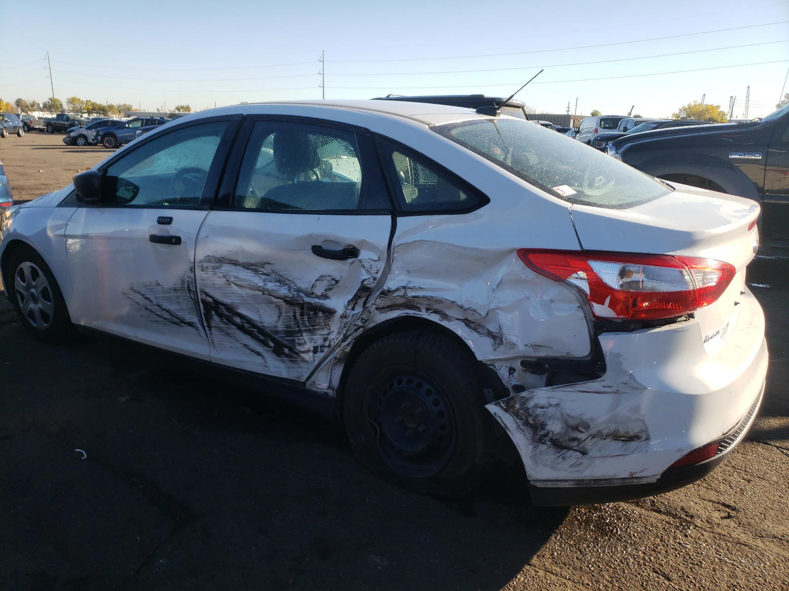 Photo 9 from auction – 2014 FORD FOCUS S with VIN 1FADP3E25EL194531
