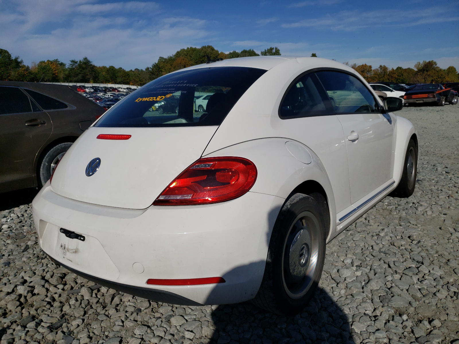 Photo 4 from auction – 2012 VOLKSWAGEN BEETLE with VIN 3VWJP7AT3CM611530