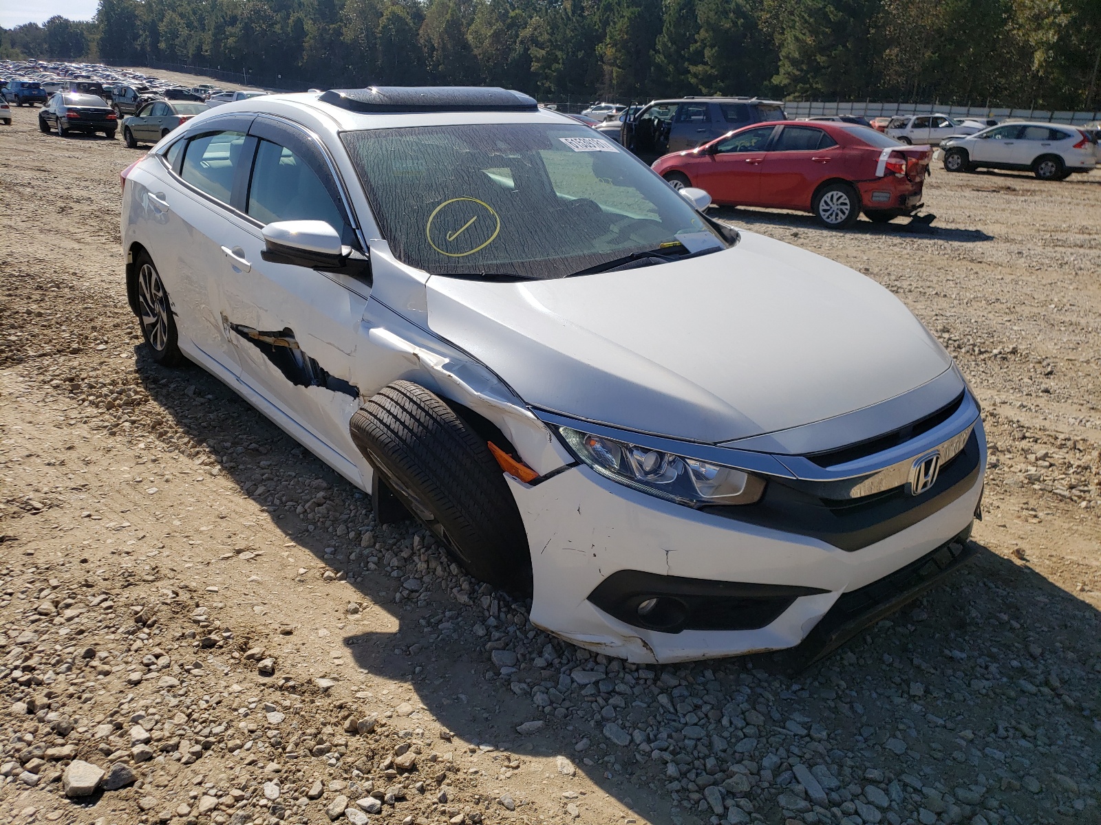 Photo 1 from auction – 2018 HONDA CIVIC EX with VIN 19XFC2F86JE035399