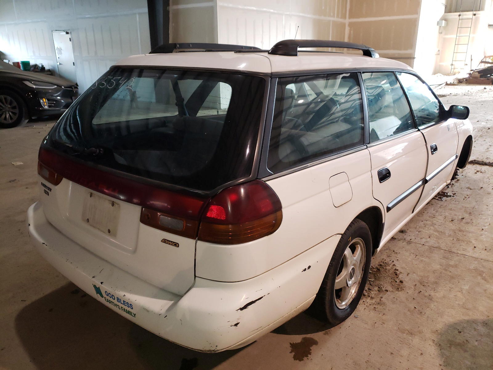 Photo 4 from auction – 1997 SUBARU LEGACY L with VIN 4S3BK4358V7322790