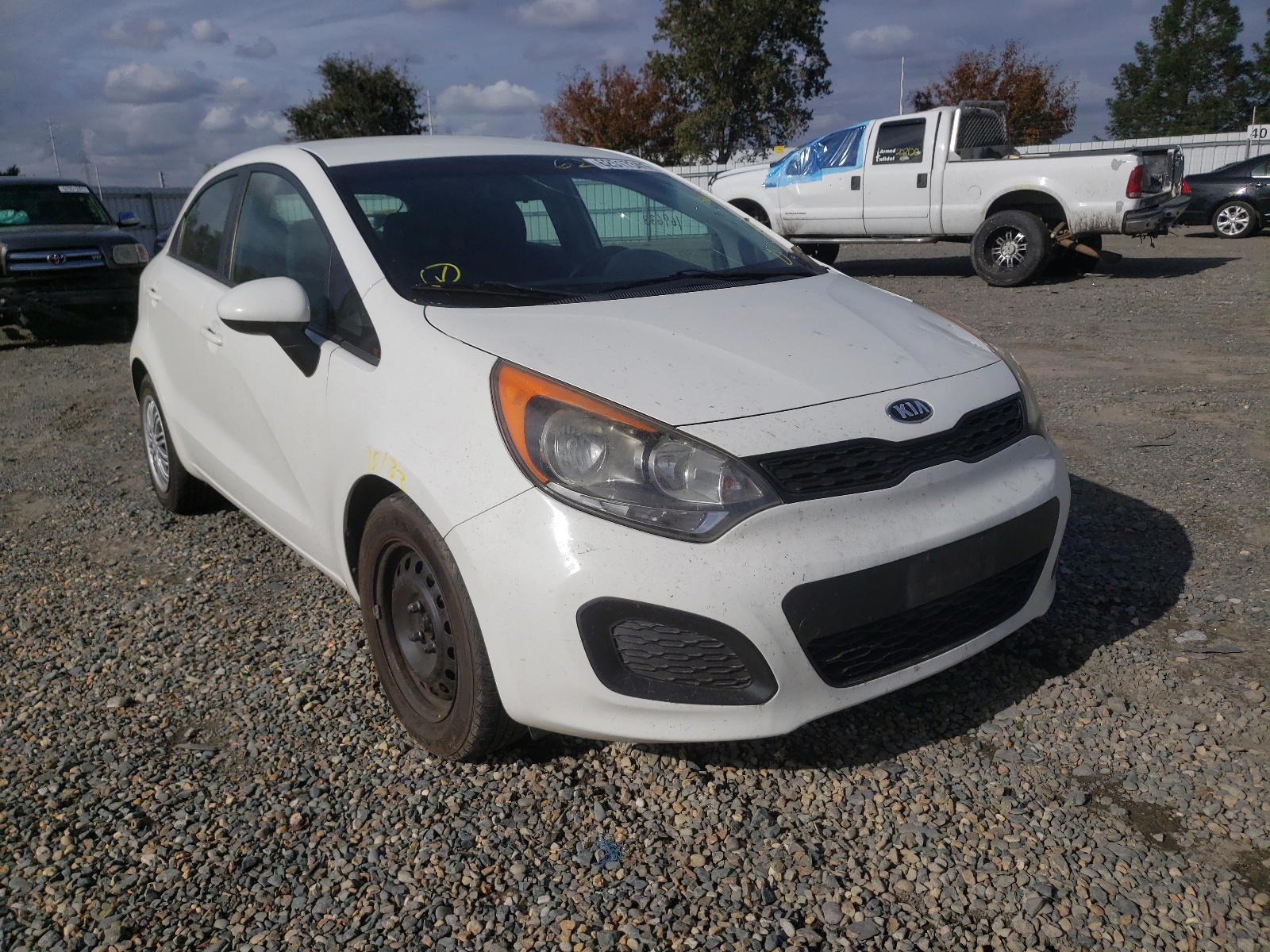KIA RIO LX 2013 with VIN KNADM5A35D6155607 - Photo from auction
