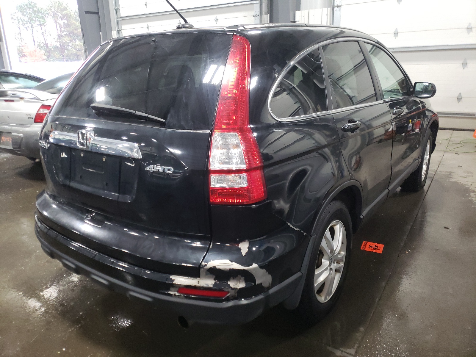 Photo 4 from auction – 2011 HONDA CR-V EXL with VIN 5J6RE4H75BL041799
