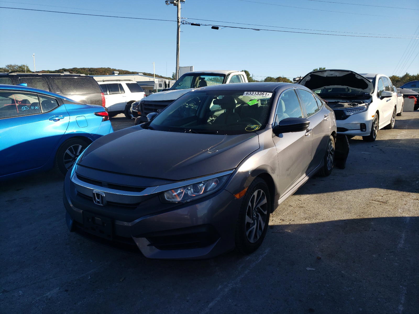 Photo 2 from auction – 2016 HONDA CIVIC EX with VIN 19XFC2F76GE027920