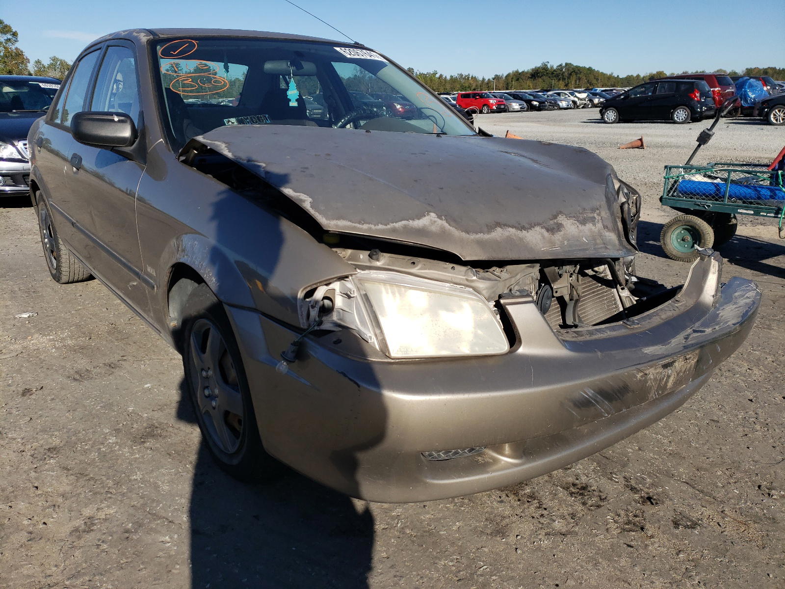 MAZDA PROTEGE 2000 with VIN JM1BJ2228Y0258228 - Photo from auction