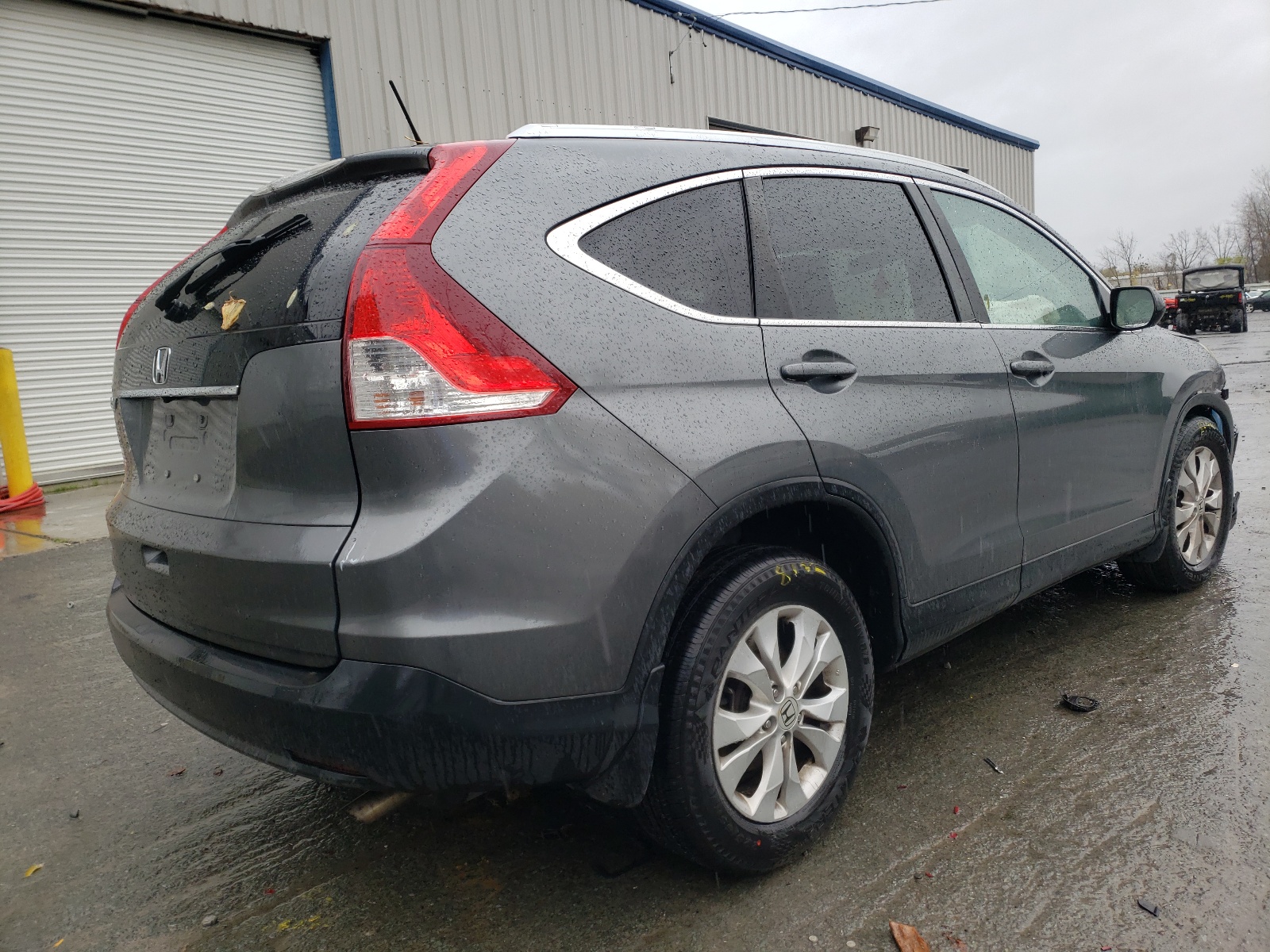 Photo 4 from auction – 2014 HONDA CR-V EXL with VIN 5J6RM3H70EL024491
